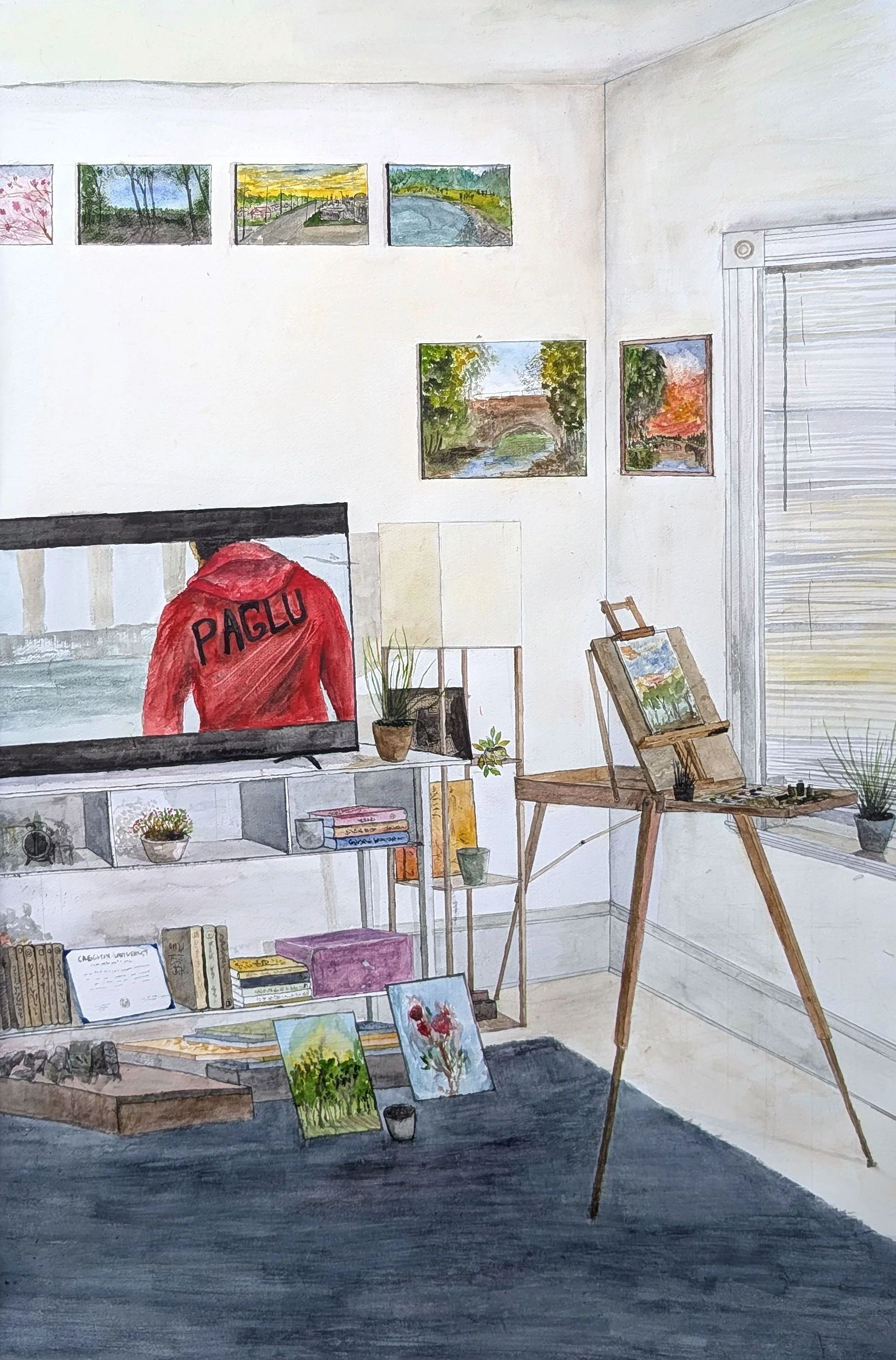 A cozy room with a large window, decorated for an artist's workspace, featuring a painting easel, several small landscape paintings, a bookshelf with books, potted plants, and a television displaying a person wearing a red shirt with