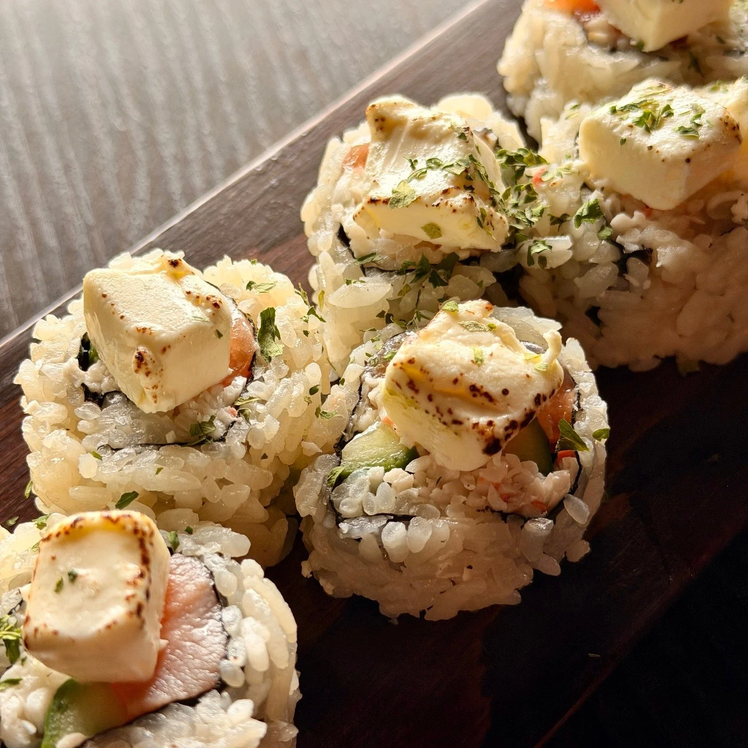 Classic roots. Nagisa twist.
The Philadelphia Roll was born in the U.S. as a bridge between Japanese sushi and Western taste&mdash;combining fresh fish with cream cheese for a richer, more familiar flavor profile. It became one of the most iconic &ld