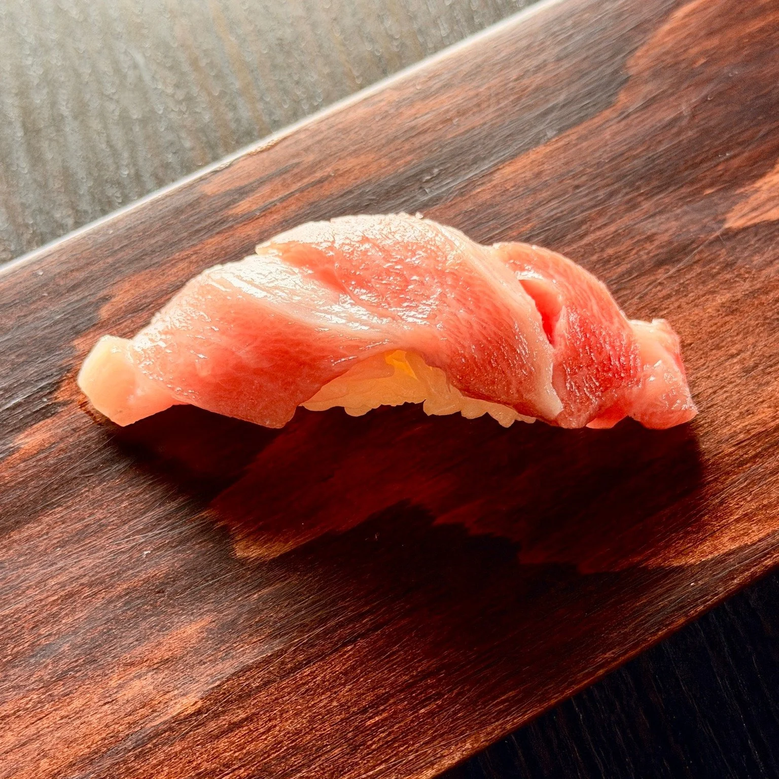 At Nagisa Sushi, our nigiri is crafted daily by Chef Hajime, who expertly selects, cuts, and manages fish flown in fresh from Japan. Each piece is prepared with precision and care to deliver peak flavor at the perfect moment. His knowledge and eye fo
