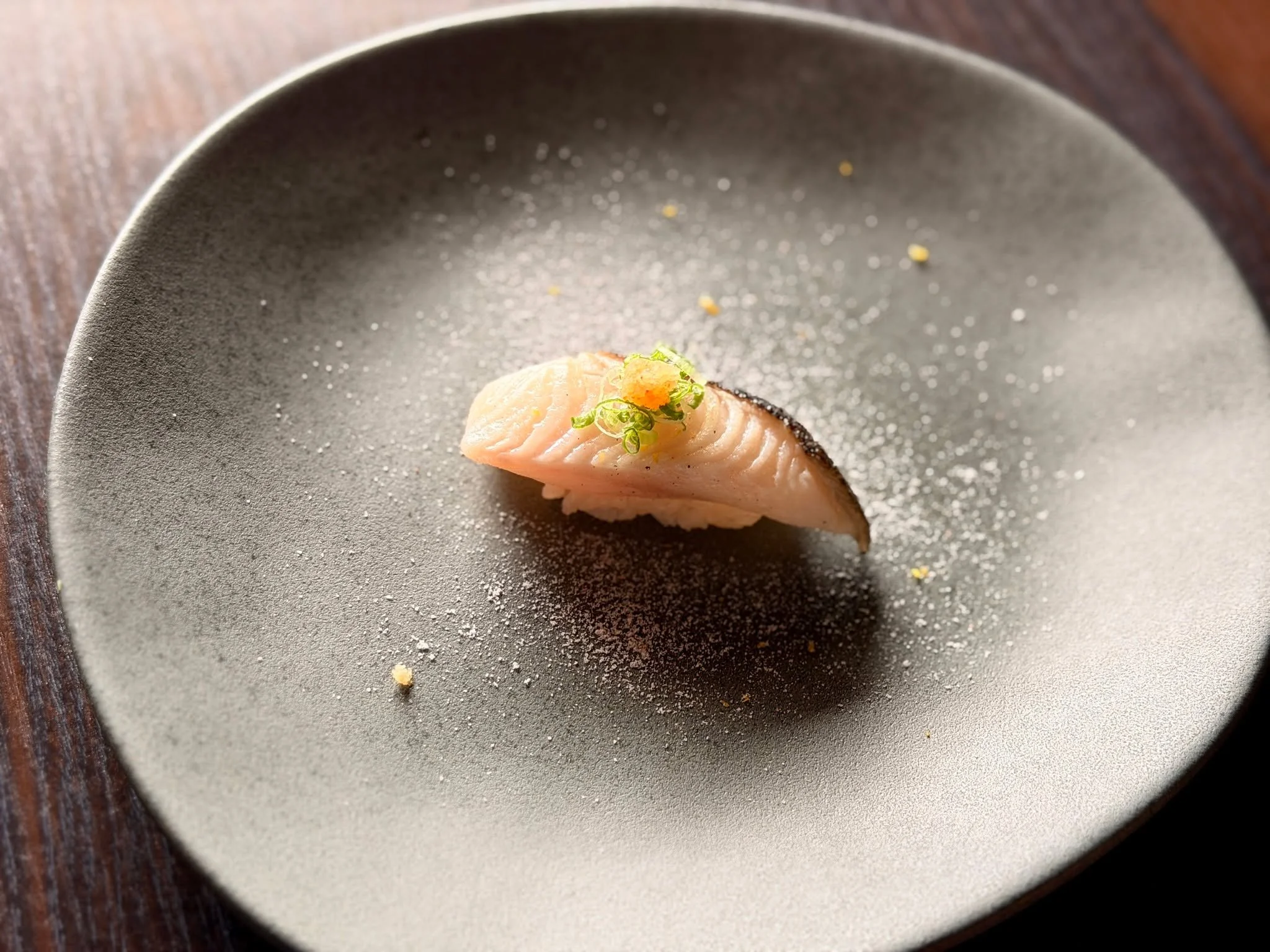 Black cod.
Soft, rich, almost melting&mdash;finished with a light sear to unlock its depth.

A touch of citrus.
A hint of green onion.
Just enough to lift, never to hide.

This is where simplicity becomes luxury.

#NagisaSushi #BlackCod #OmakaseVibes