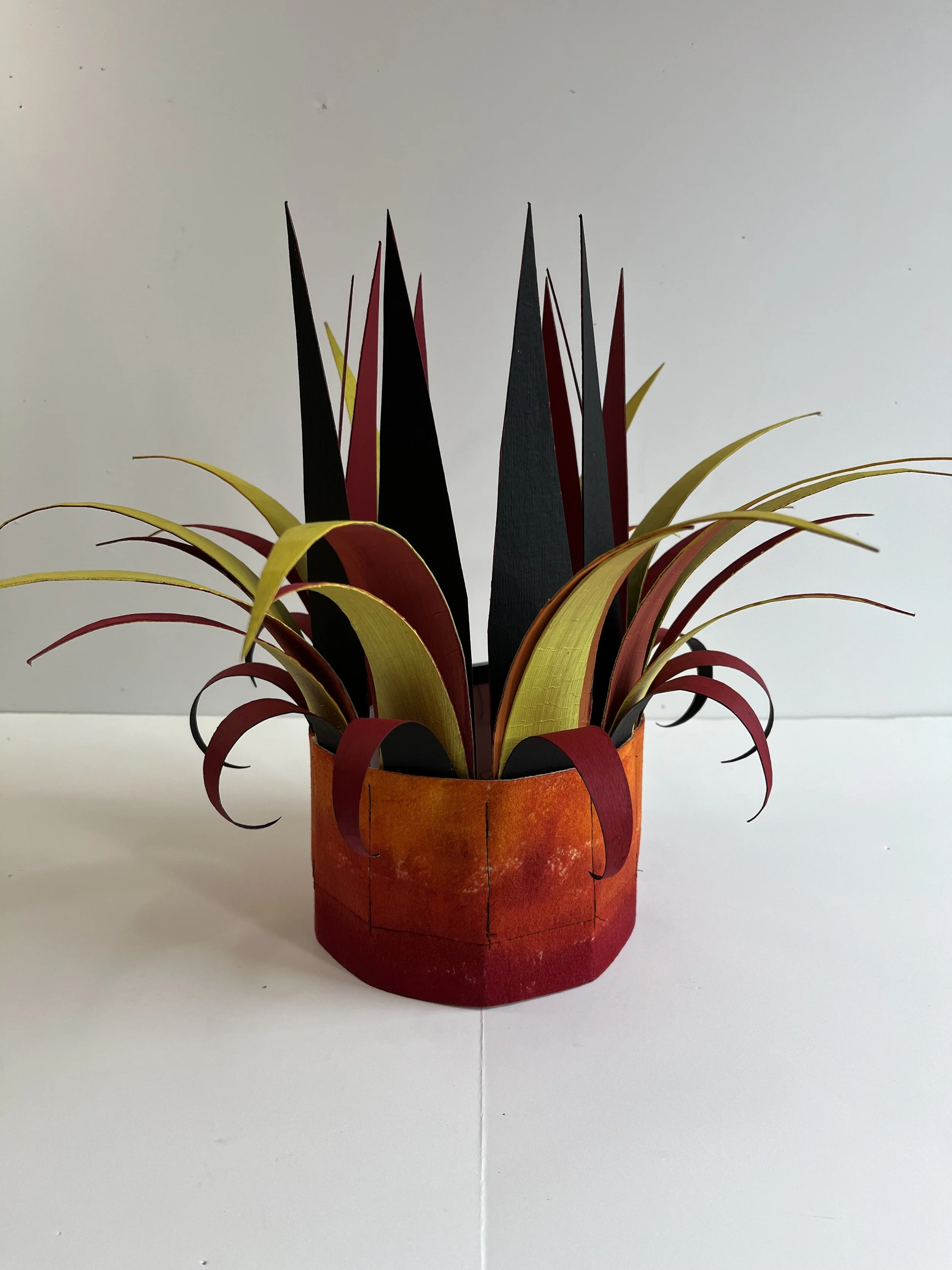 The Pointy Crowns Series 1:  Orange Base with Red, Yellow and Black