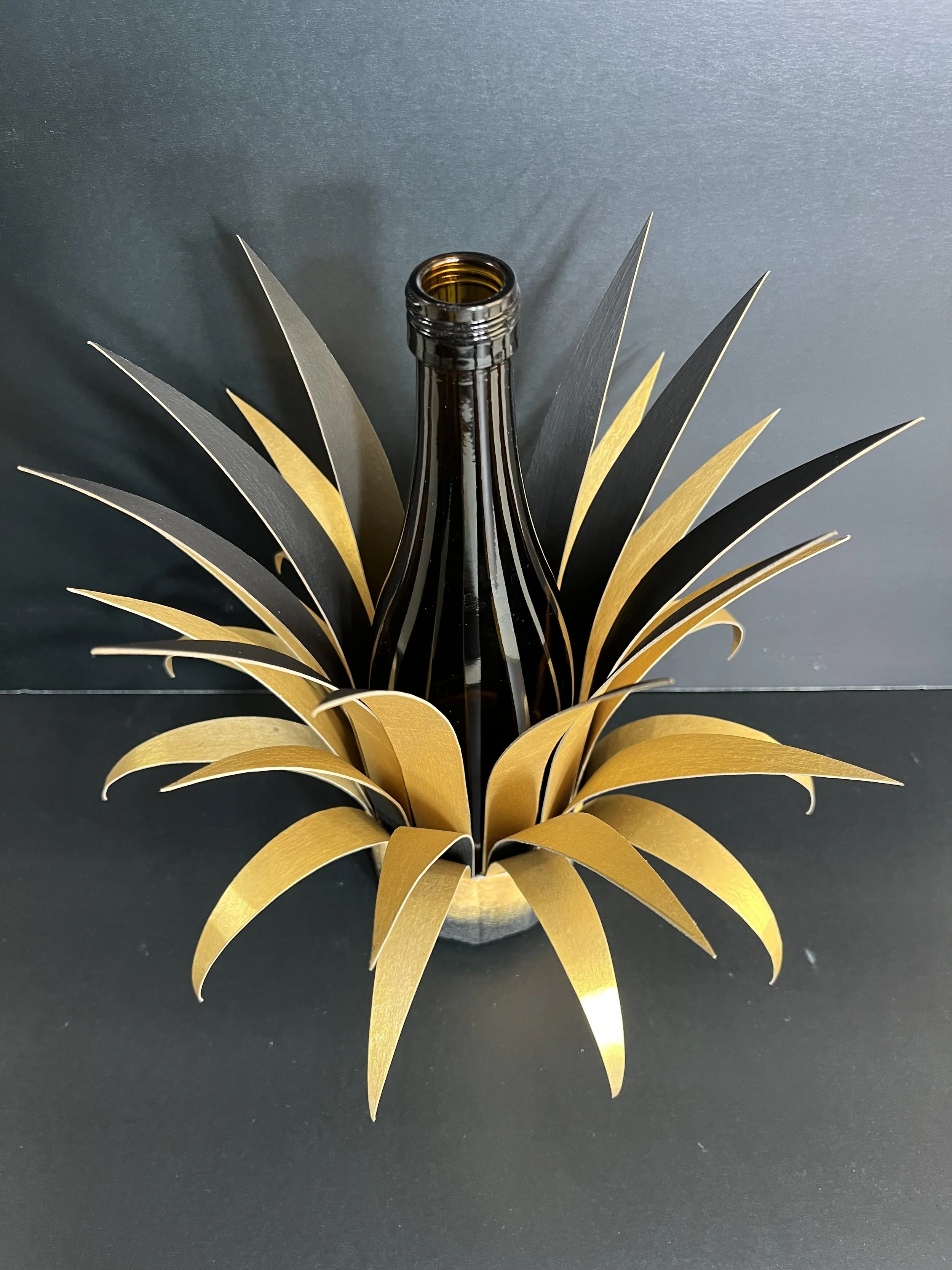Bottle Crown:  Brown Bottle with Gold and Black Spikes