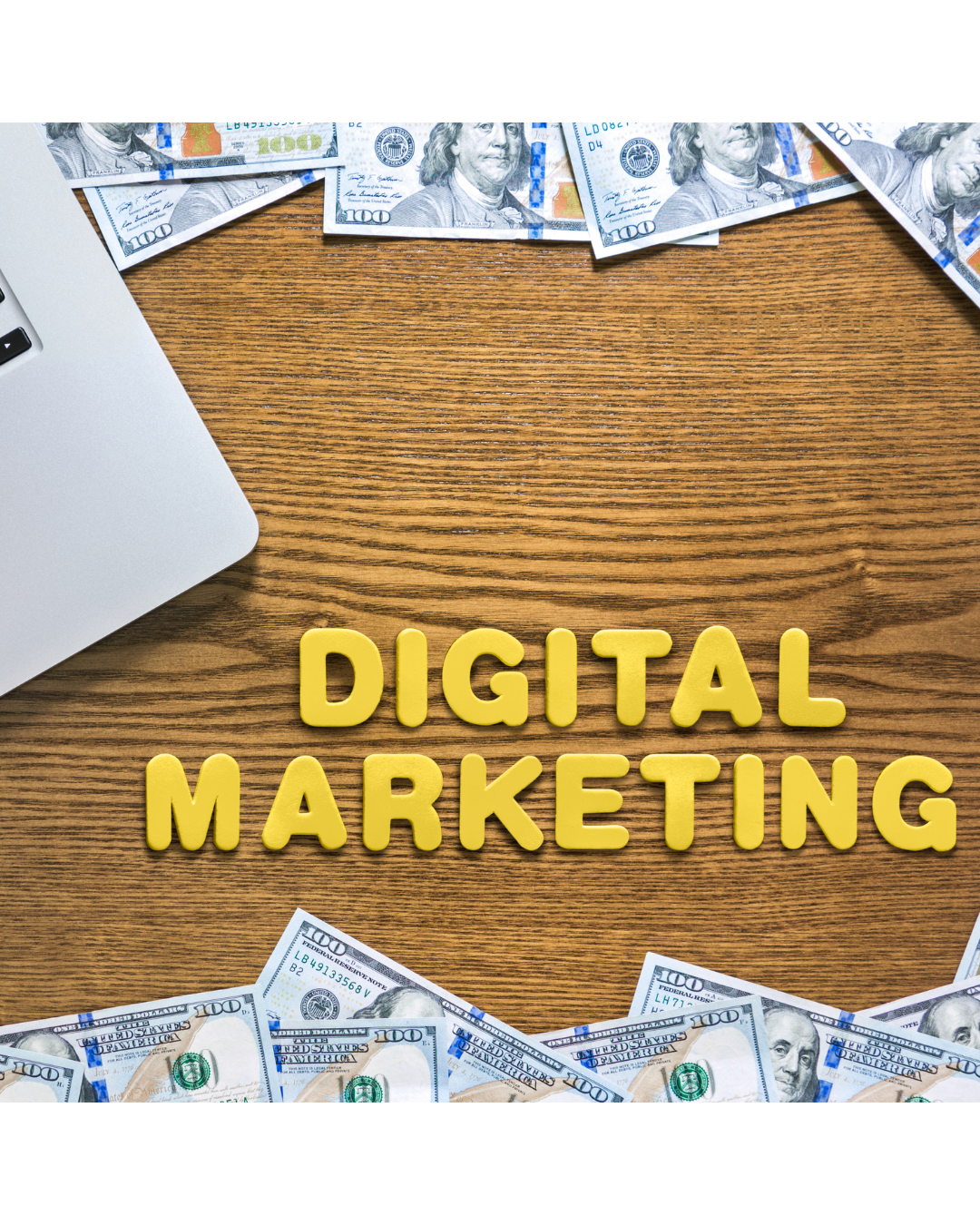 Yellow 3D letters spelling 'Digital Marketing' on a wooden surface, surrounded by scattered 100-dollar bills, with part of a silver laptop visible in the top left corner.