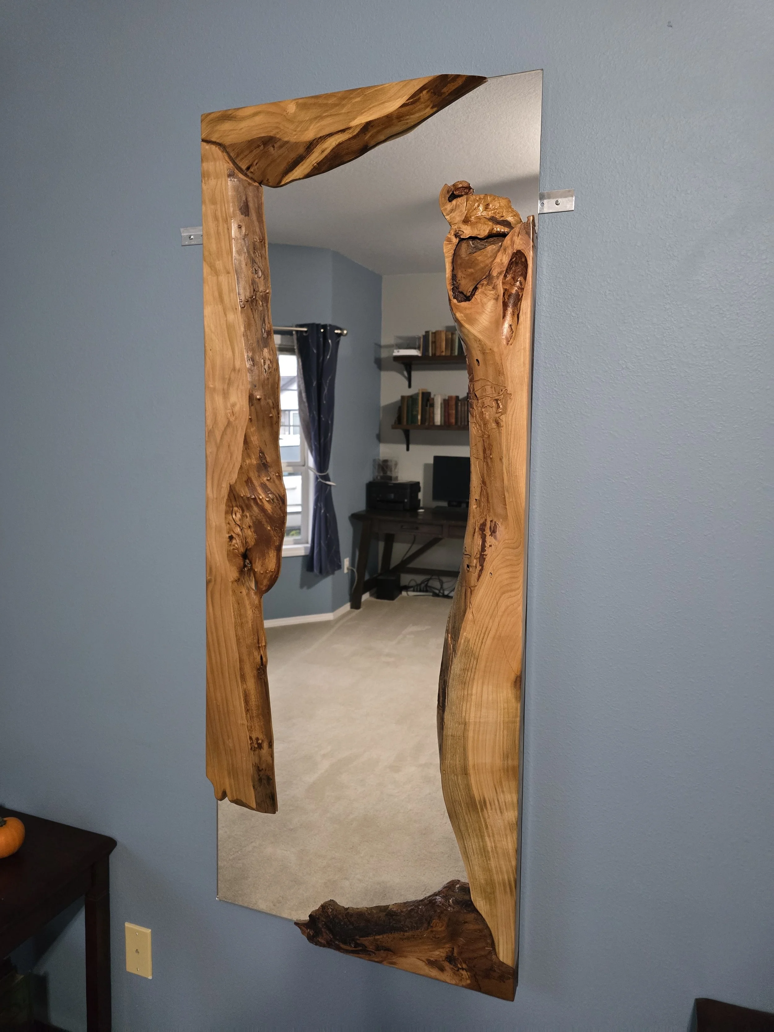 Custom full size cherry live edge mirror that is great for dressing.