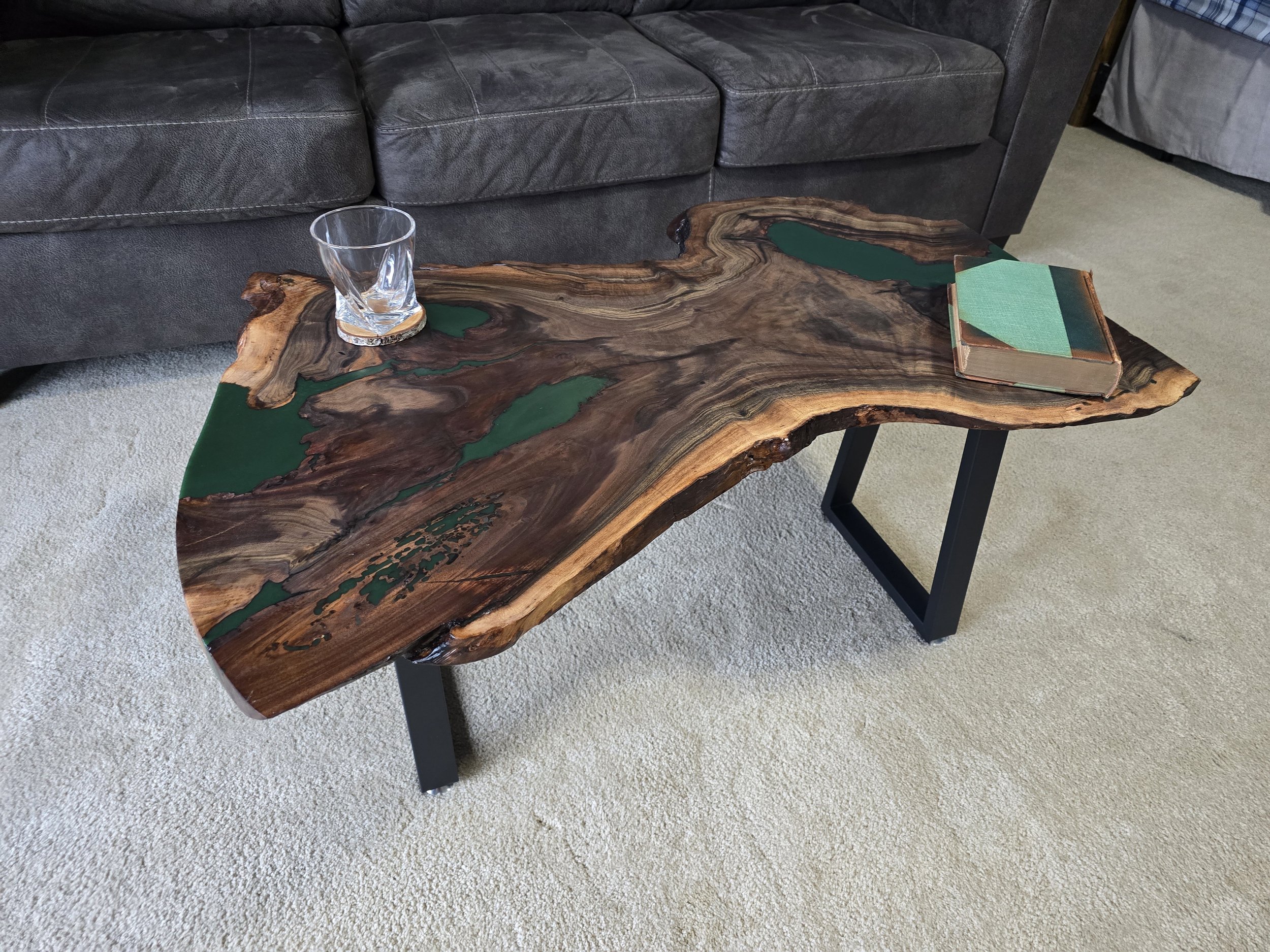 live edge coffee table made from walnut and green epoxy with metal table legs