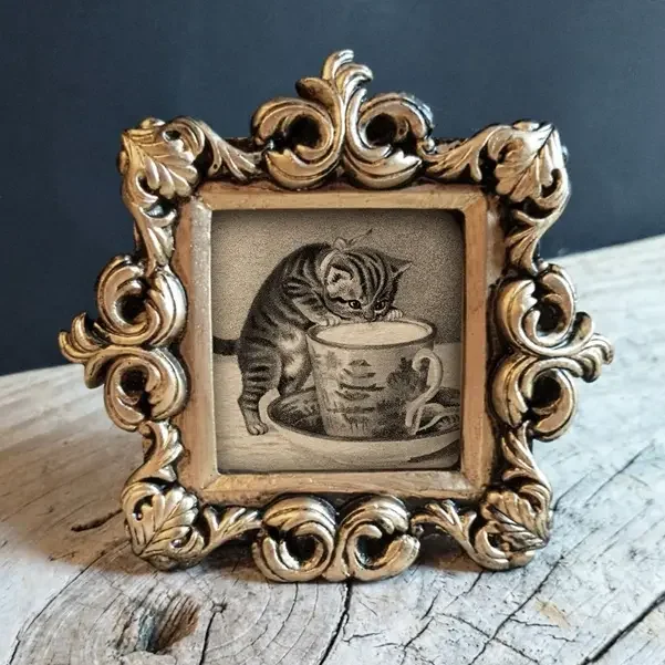 Kitten Cutie Drinking Milk in Ornate Frame