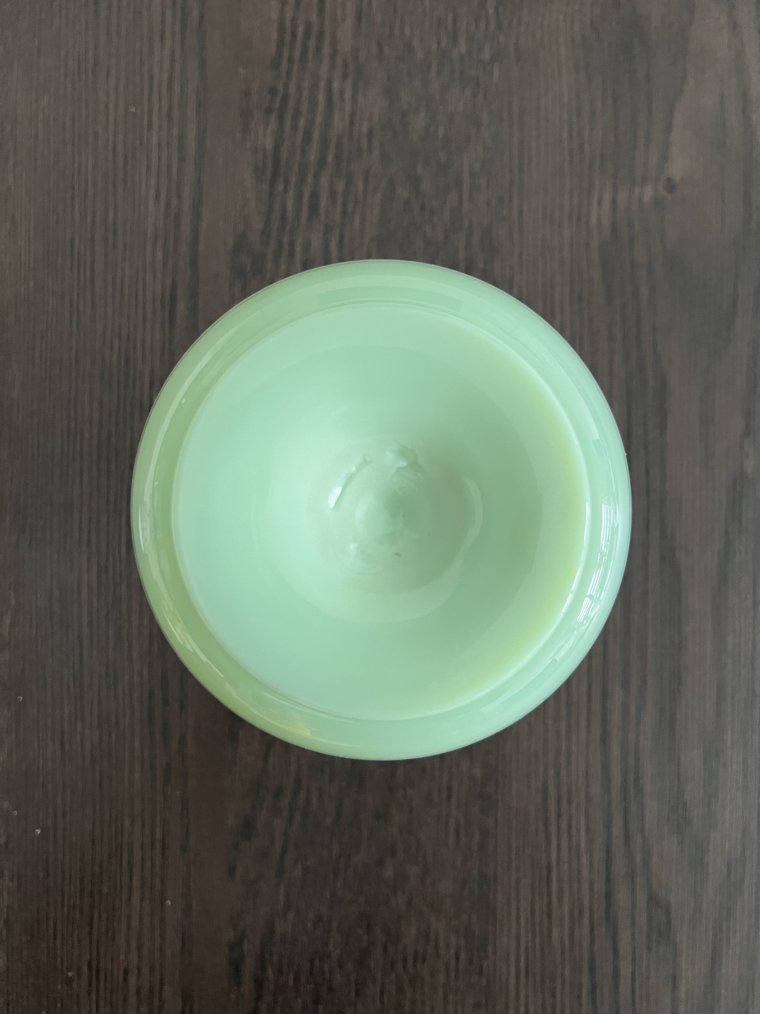 Authentic 19th-century French opaline glass vase in pistachio green. Features hand-painted enamel florals and gold gilt. Perfect for antique collectors.