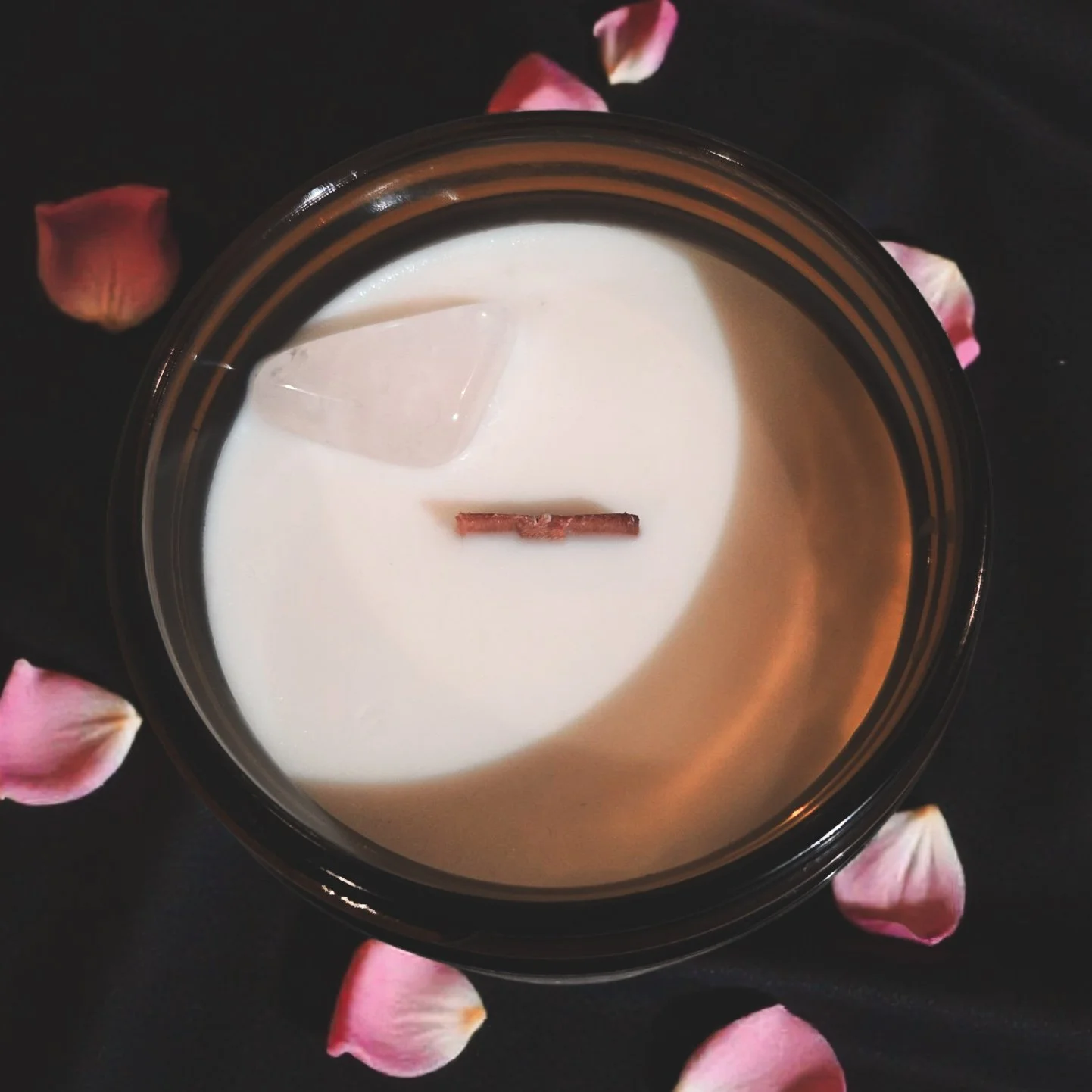 Amber jar Goddess candle with rose quartz, floral fragrance notes, and wood wick—used for intention setting, meditation, and self-love rituals.