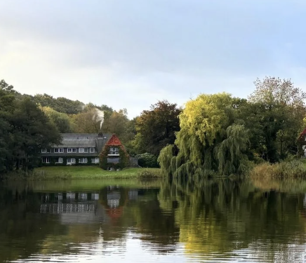 Peaceful lakeside landscape representing rest, reflection and recovery during wellness retreats