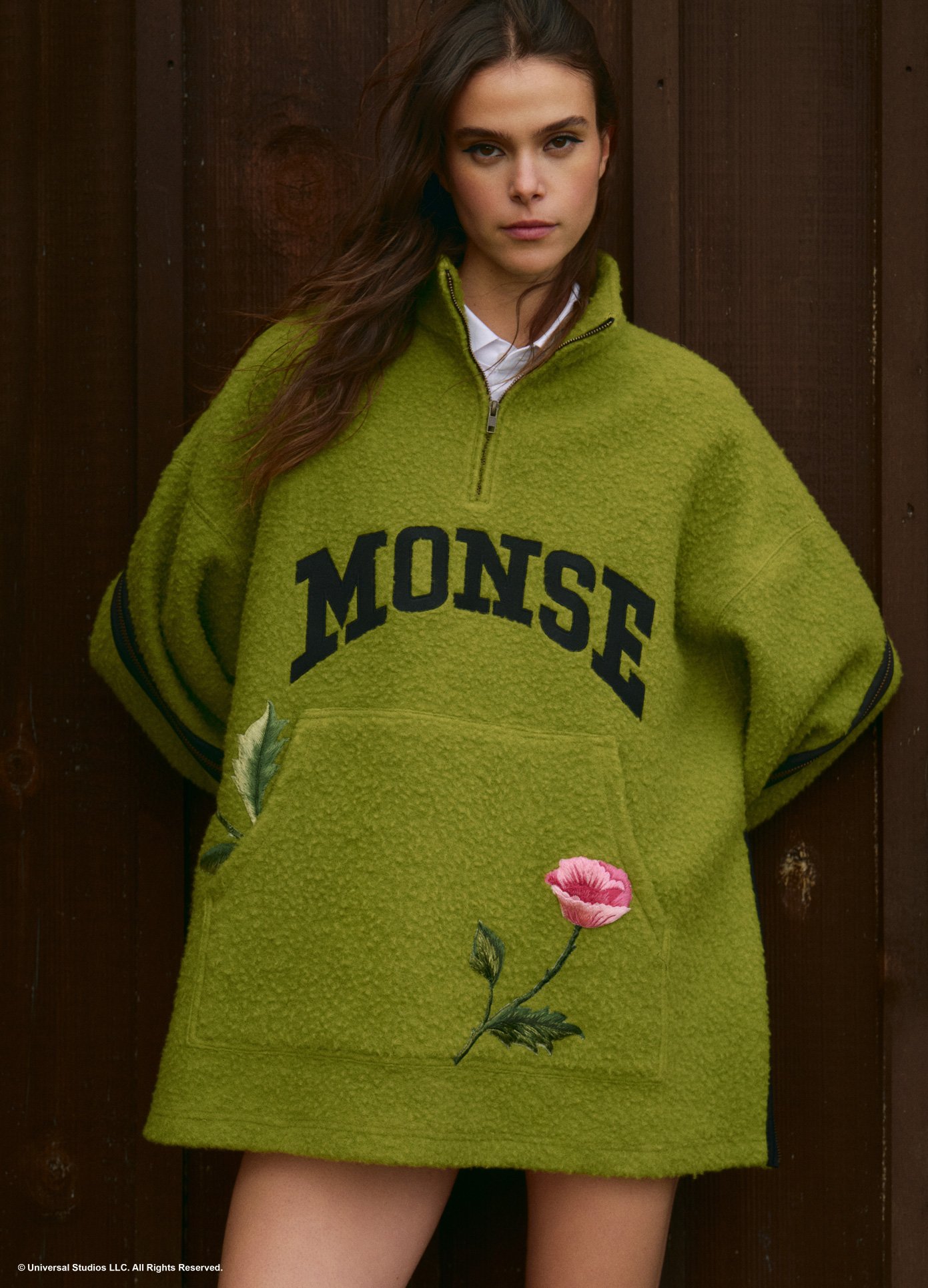 monse-wicked-collaboration-oz-varsity-fleece-in-green-on-model-lifestyle-image.jpg