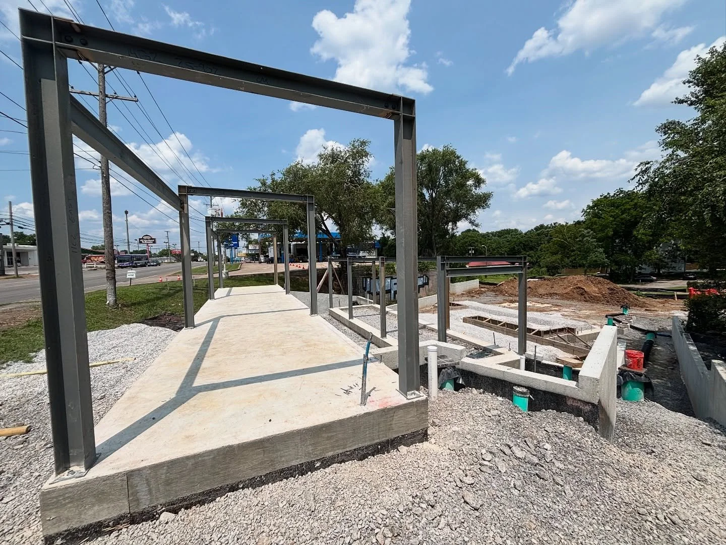 Whoa! Structural steel started going up this morning. Framing soon.