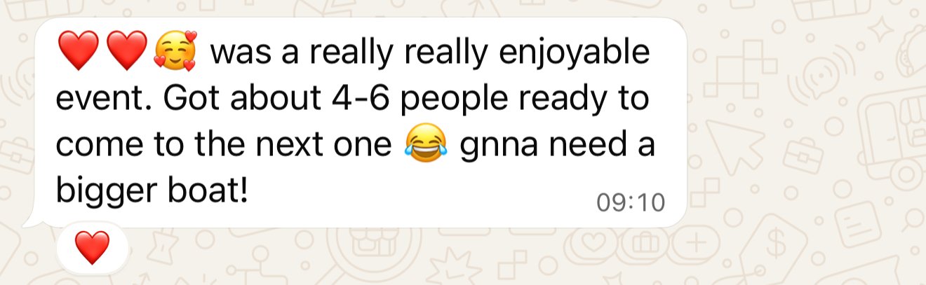 Screenshot of a WhatsApp message with a light background, containing text about enjoying an event with some emojis, including hearts, a smiling face with hearts, and a laughing face.