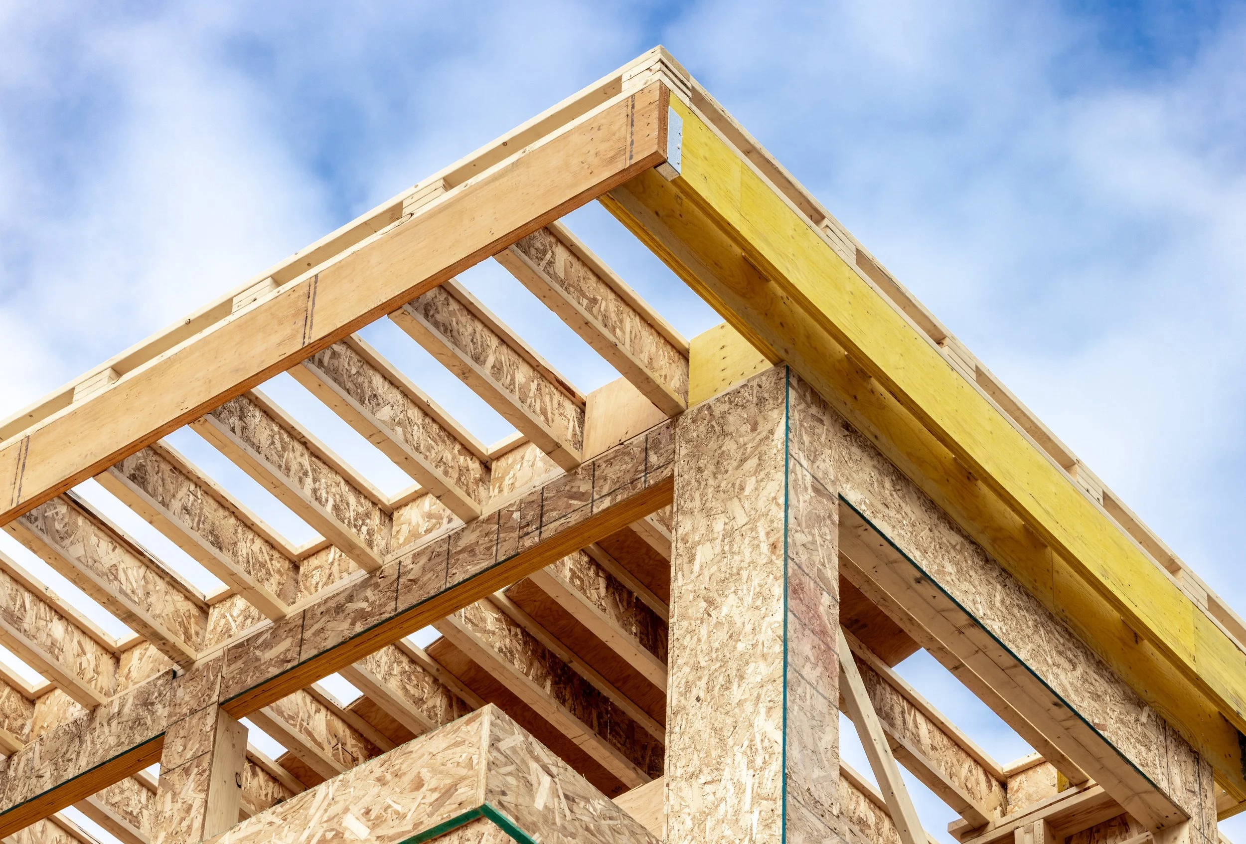 Engineered wood products used on a building under construction.