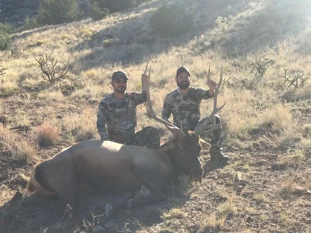 Hunter celebrating a successful guided hunt with Hook N 30 Outfitters