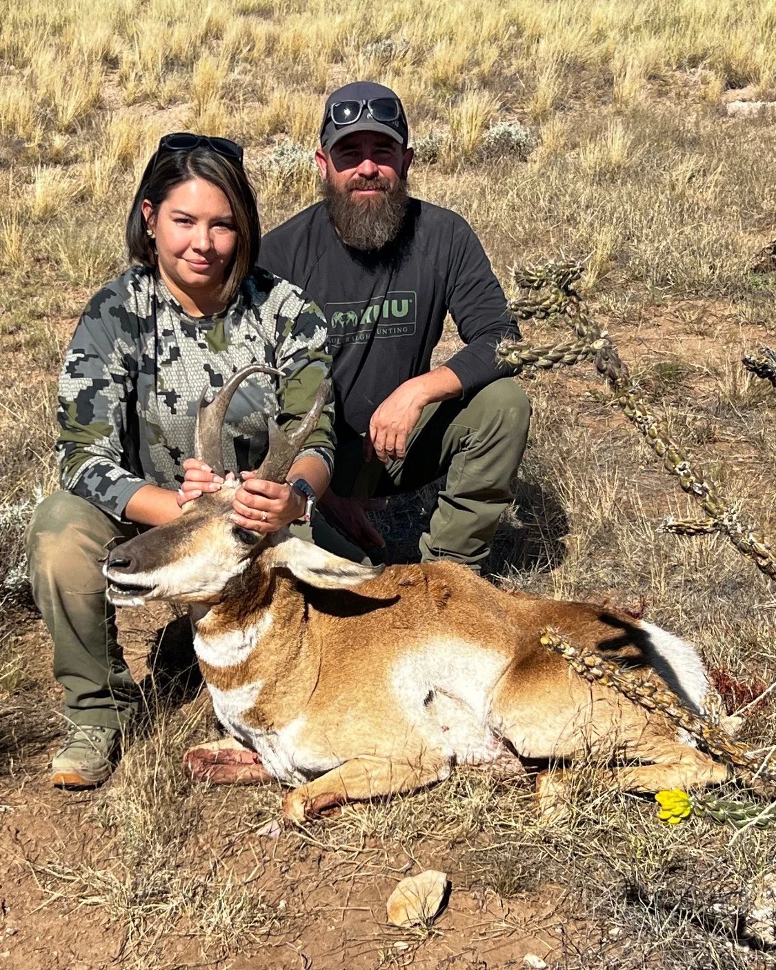 Hunter celebrating a successful guided hunt with Hook N 30 Outfitters
