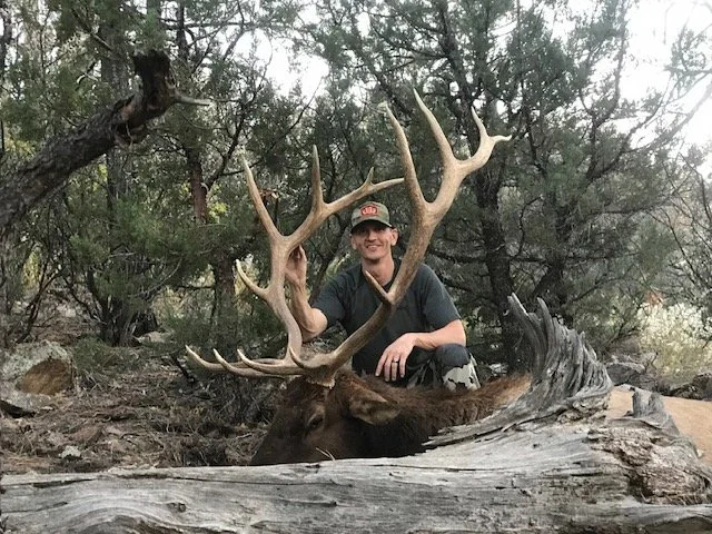 Hunter celebrating a successful guided hunt with Hook N 30 Outfitters