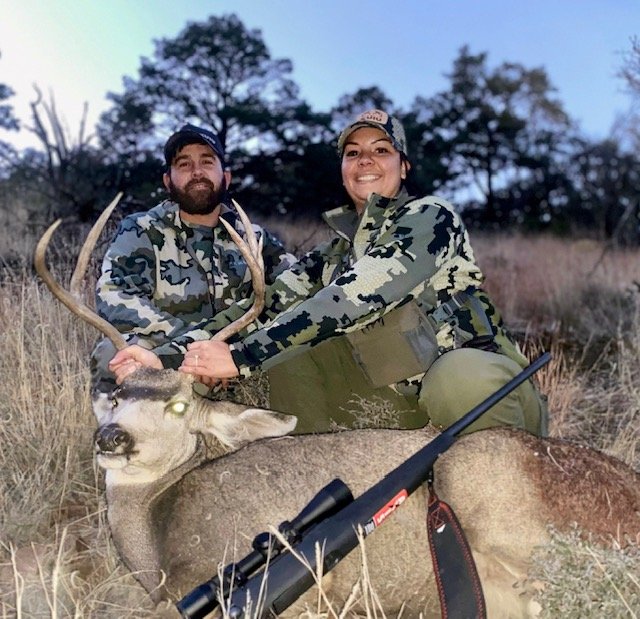 Hunter celebrating a successful guided hunt with Hook N 30 Outfitters