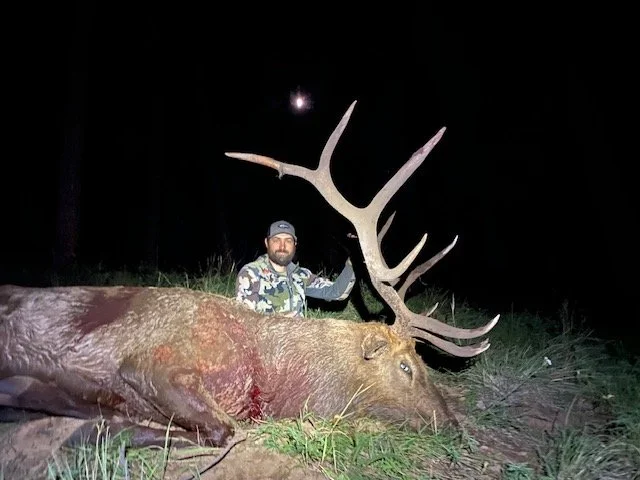 Hunter celebrating a successful guided hunt with Hook N 30 Outfitters