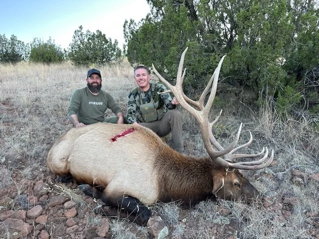 Hunter celebrating a successful guided hunt with Hook N 30 Outfitters