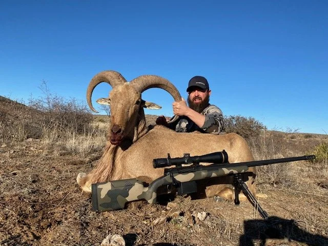 Hunter celebrating a successful guided hunt with Hook N 30 Outfitters
