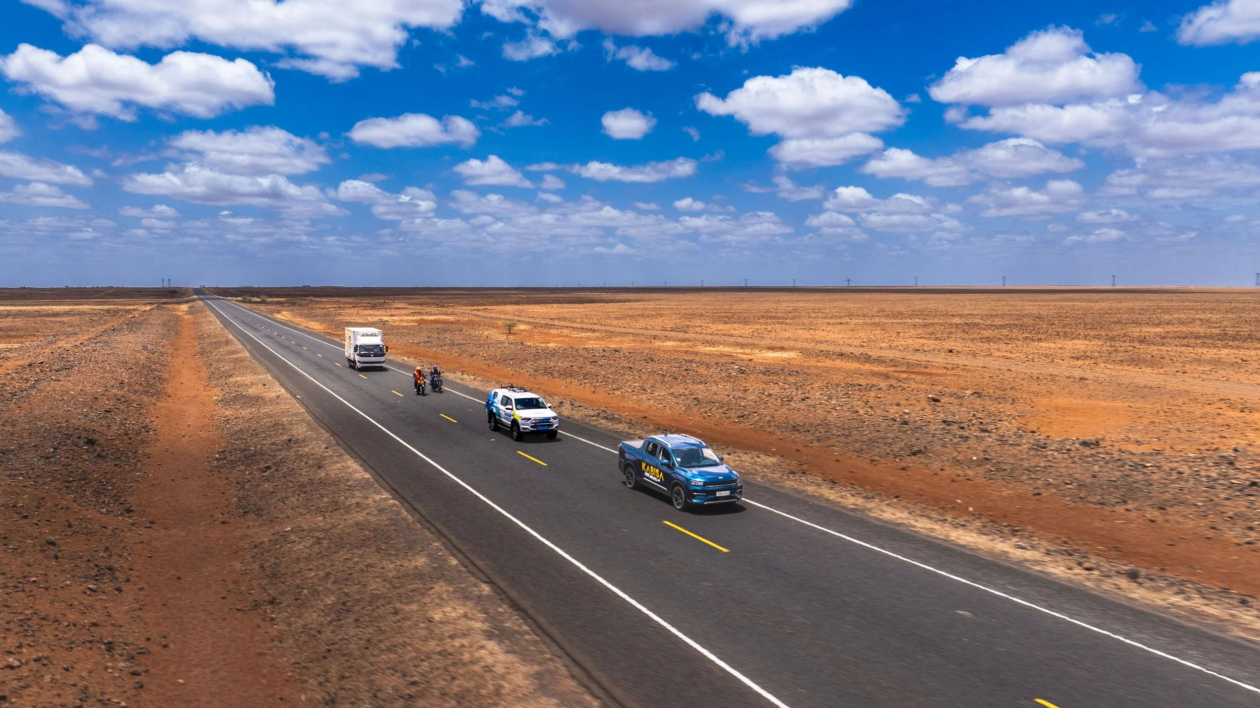 Road to Africa electric convoy on an open road