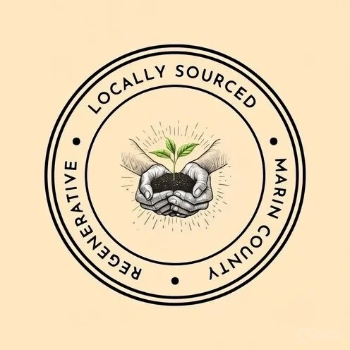 A circular logo with the text "Locally Sourced Marine County" and "Rejuvenative" around the edge, featuring a hand holding soil with a small green sprout.