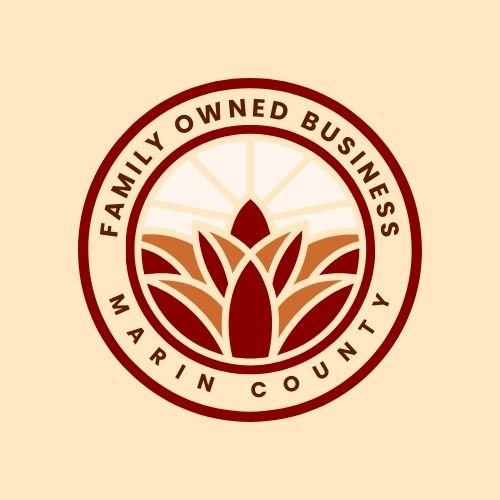 Logo for a family-owned business in Marin County featuring a stylized plant or flower within a circular border.