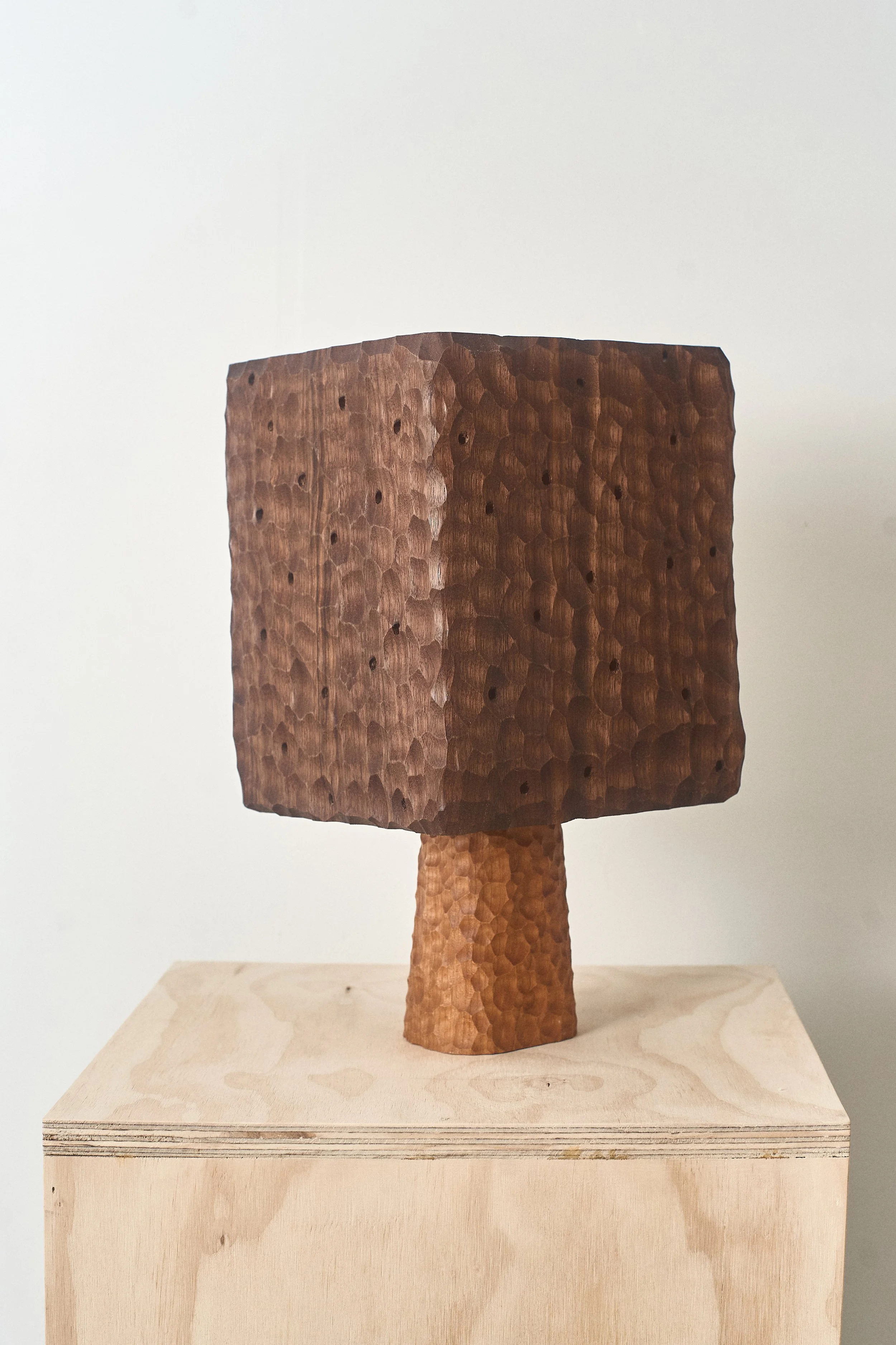 Side view of the cherry table lamp with its reclaimed walnut shade.