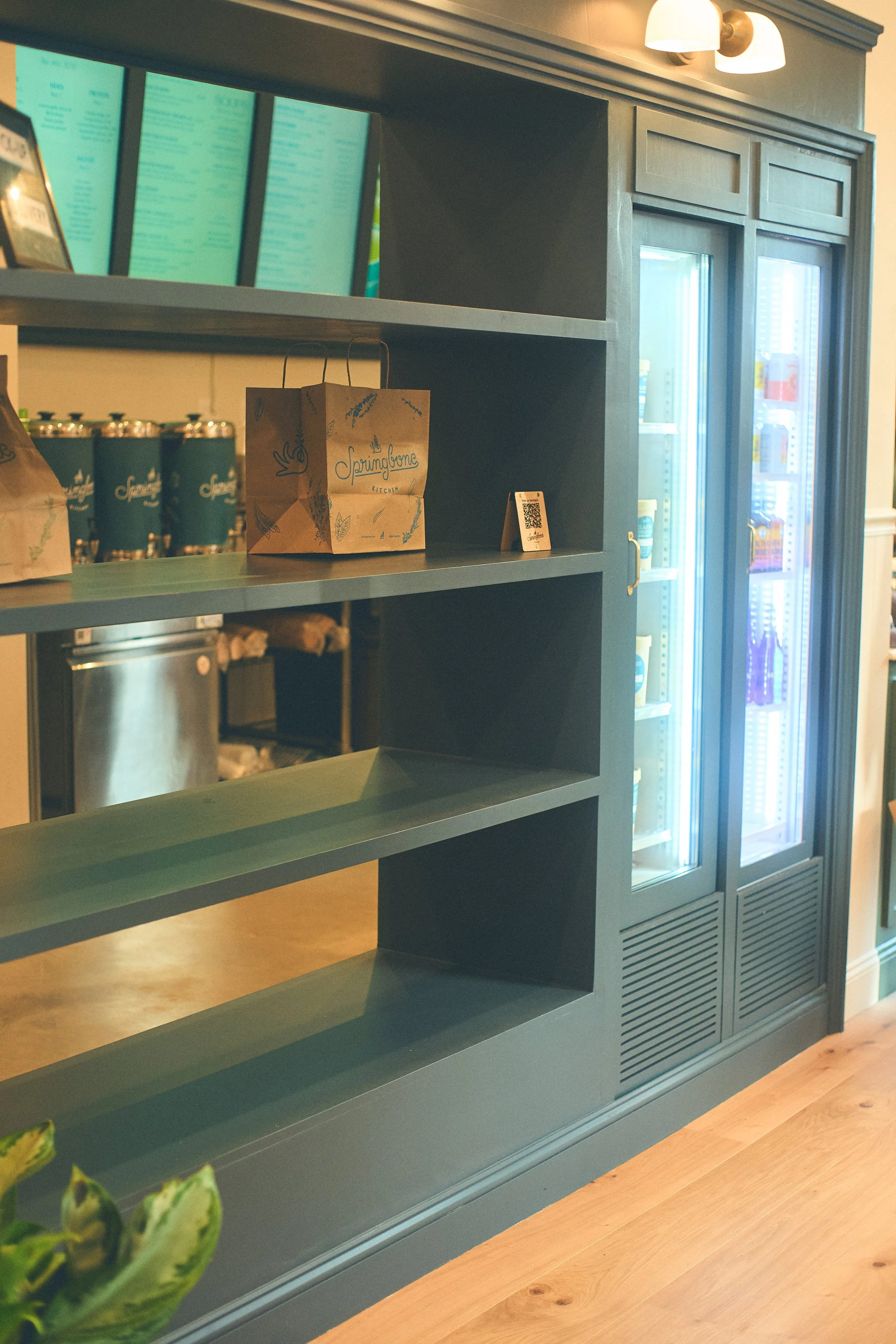Custom retail build-out for Spring Bone at 541 Columbus Ave in NYC, fabricated by Derek Designs.