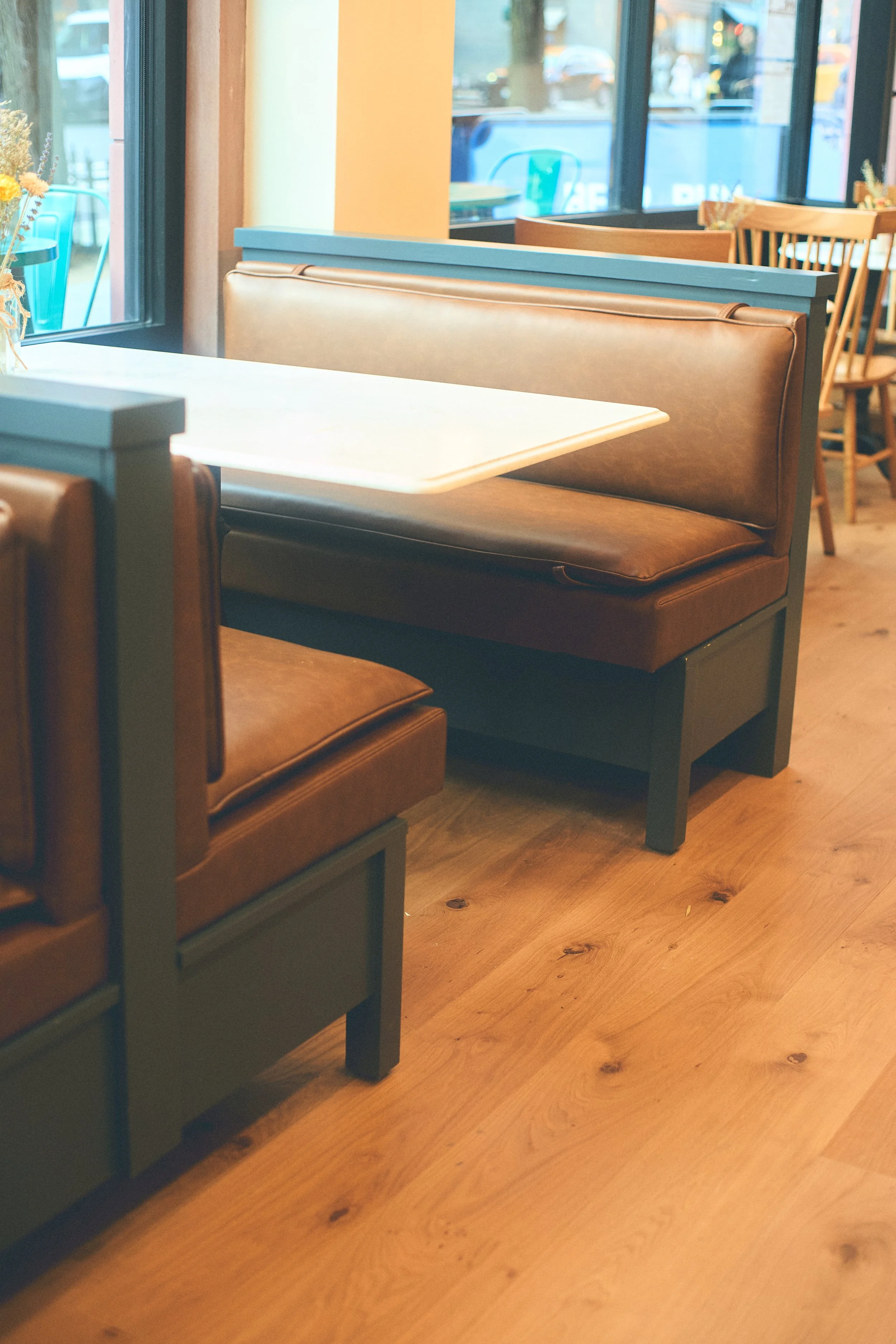 Completed Spring Bone retail interior with custom displays, cabinetry, and built-ins.