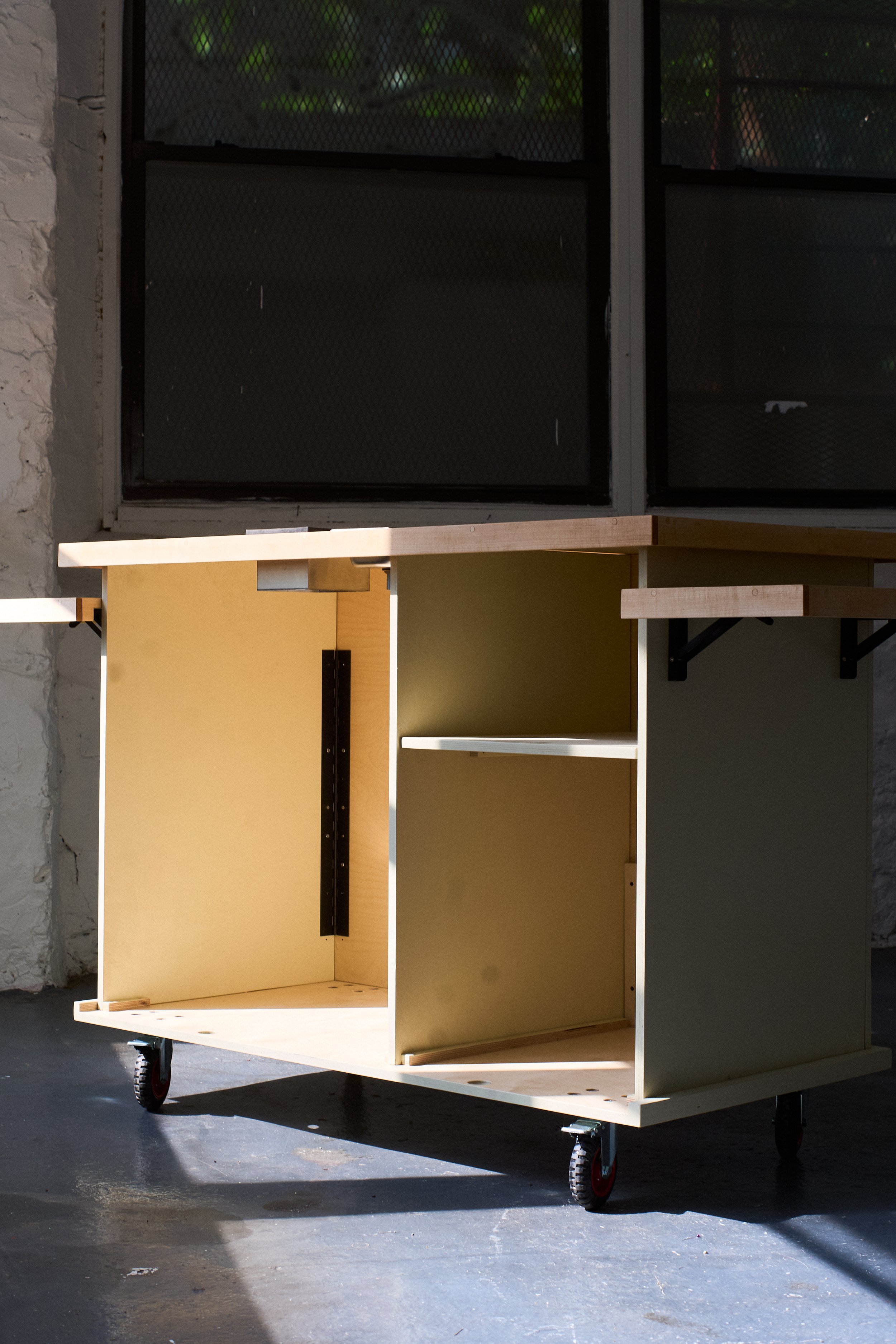 Custom coffee cart fabrication detail for a Brooklyn woodworking project.