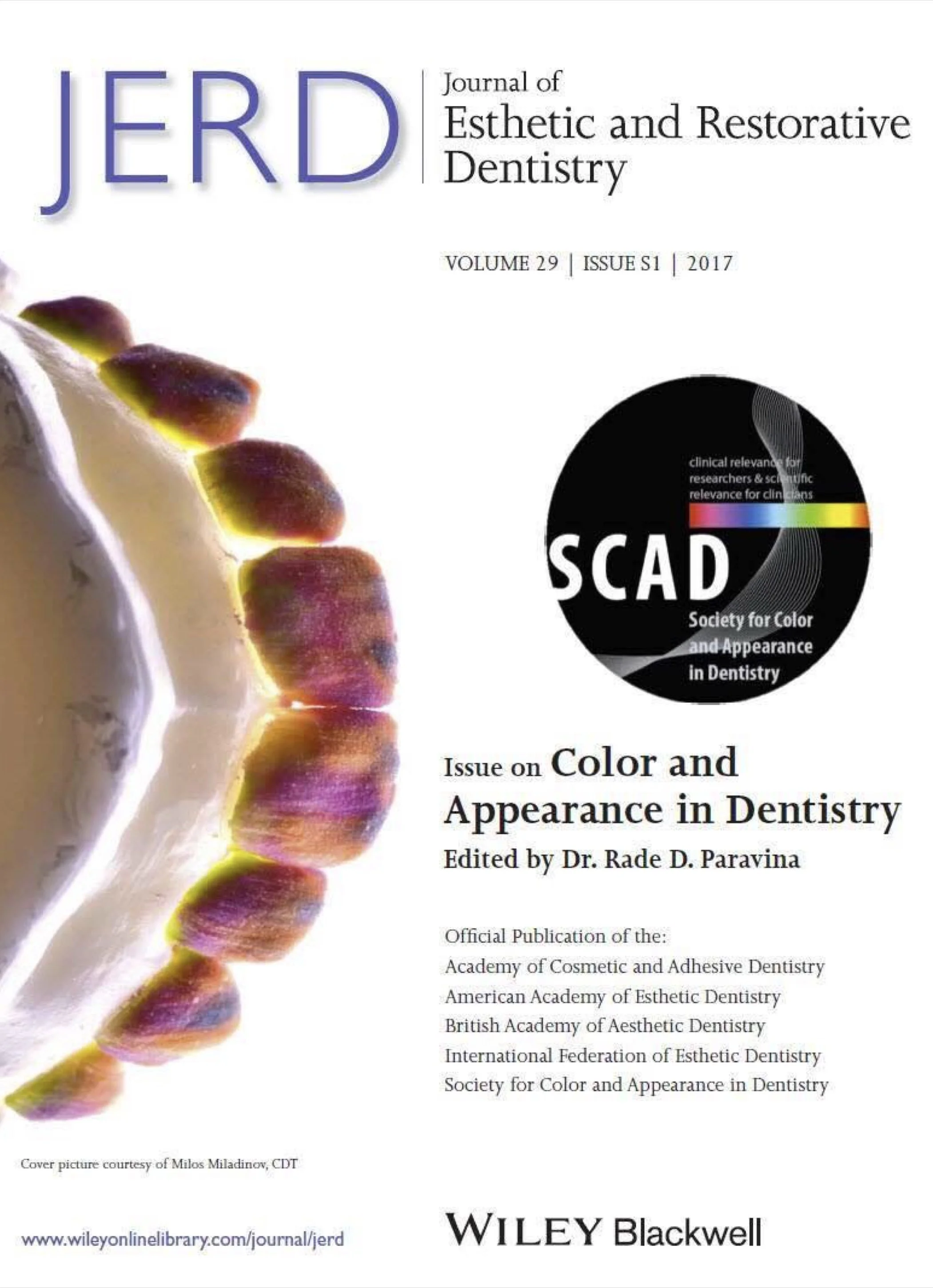 Cover of the Journal of Esthetic and Restorative Dentistry, Volume 29, Issue 1, 2017, featuring a close-up of a tooth with multicolored gingiva and a dark round logo for Society for Color and Appearance in Dentistry.