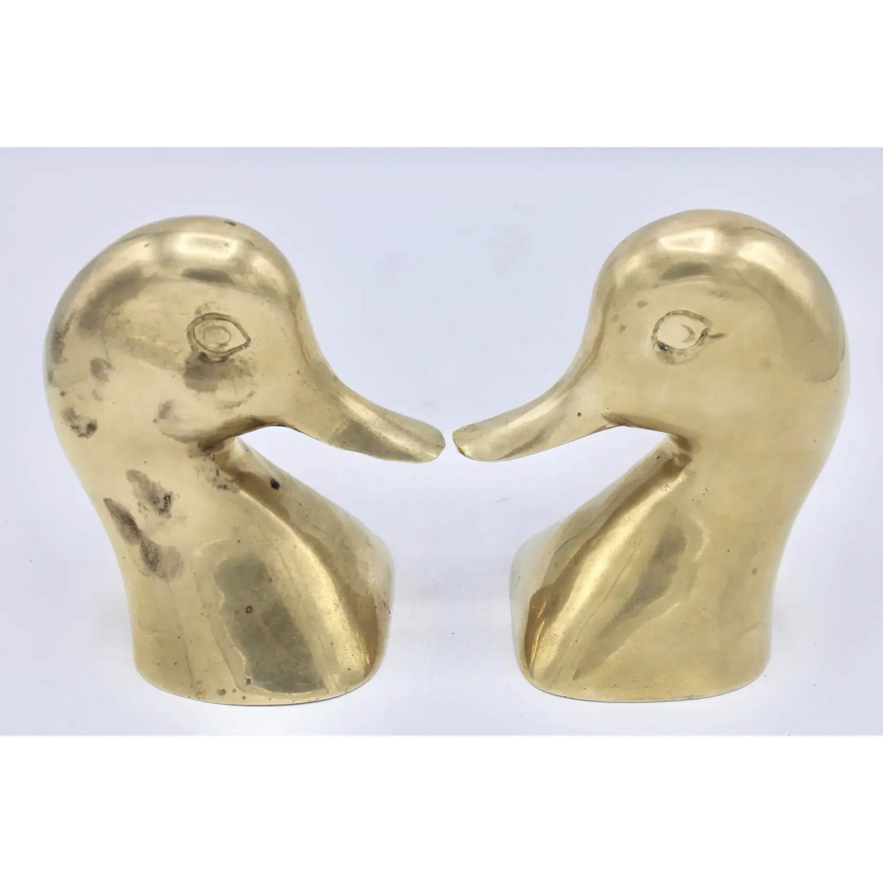 vintage-mid-century-modern-brass-duck-head-bookends-3745.webp