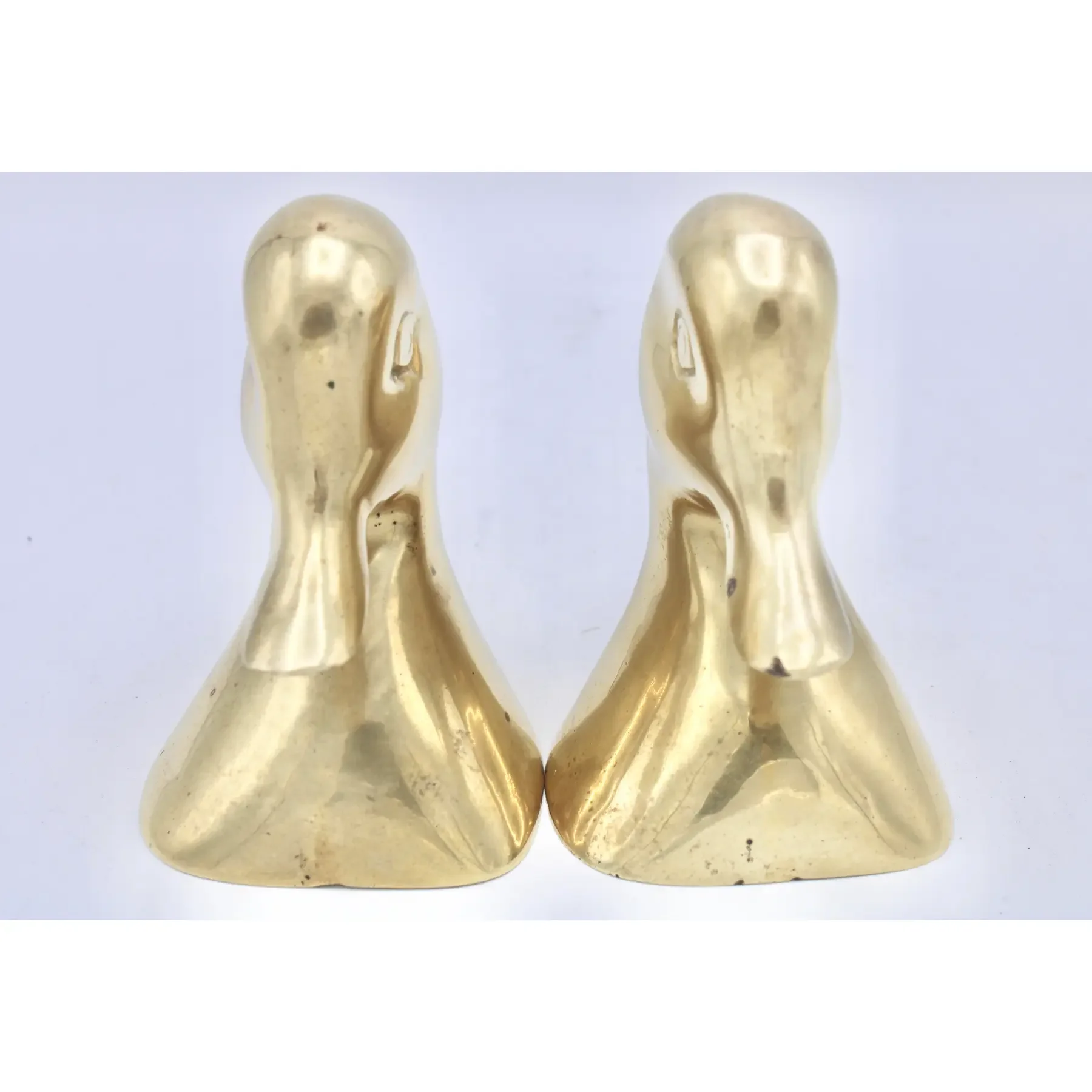 vintage-mid-century-modern-brass-duck-head-bookends-5653.webp