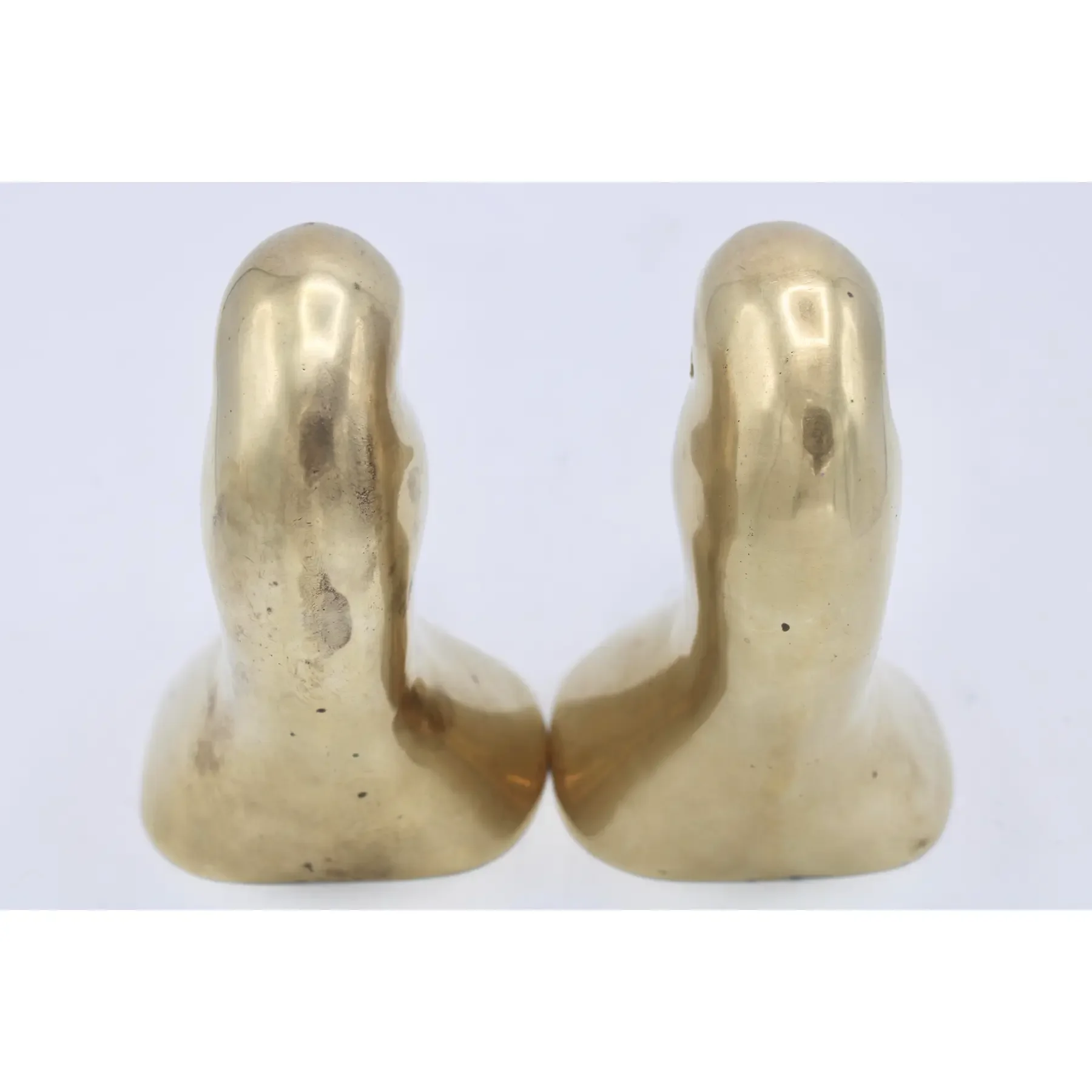 vintage-mid-century-modern-brass-duck-head-bookends-6549.webp