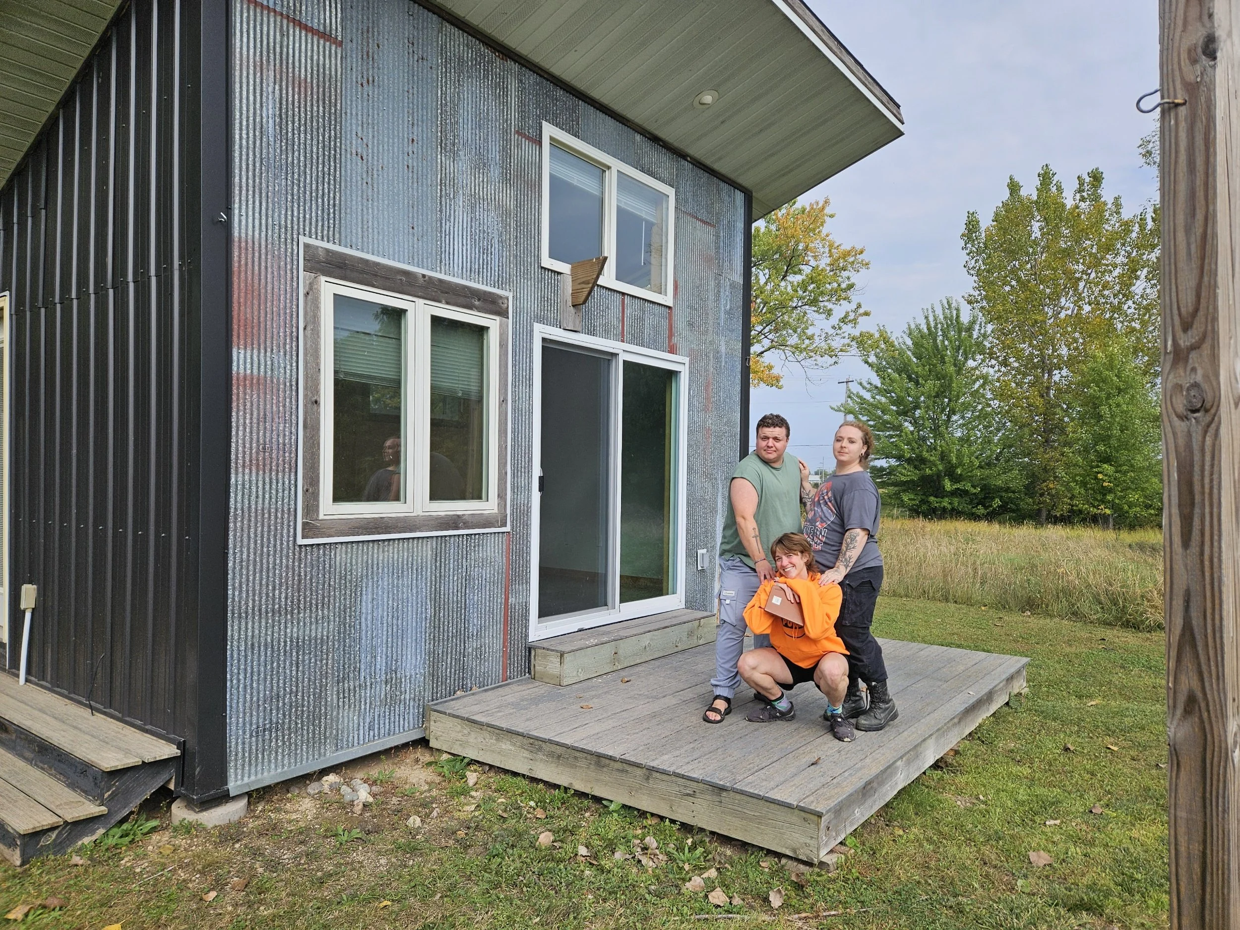 Murray, Hawthorn and Bird outside the office just after purchasing the Railroad Ave property.