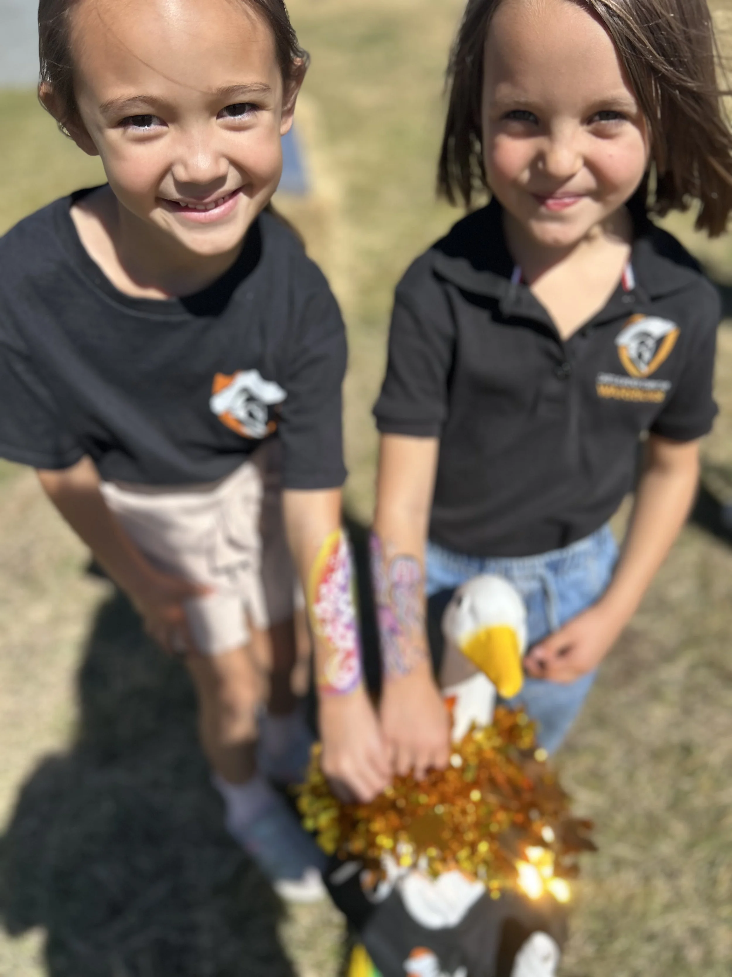 1st graders smiling in their spirit shirts