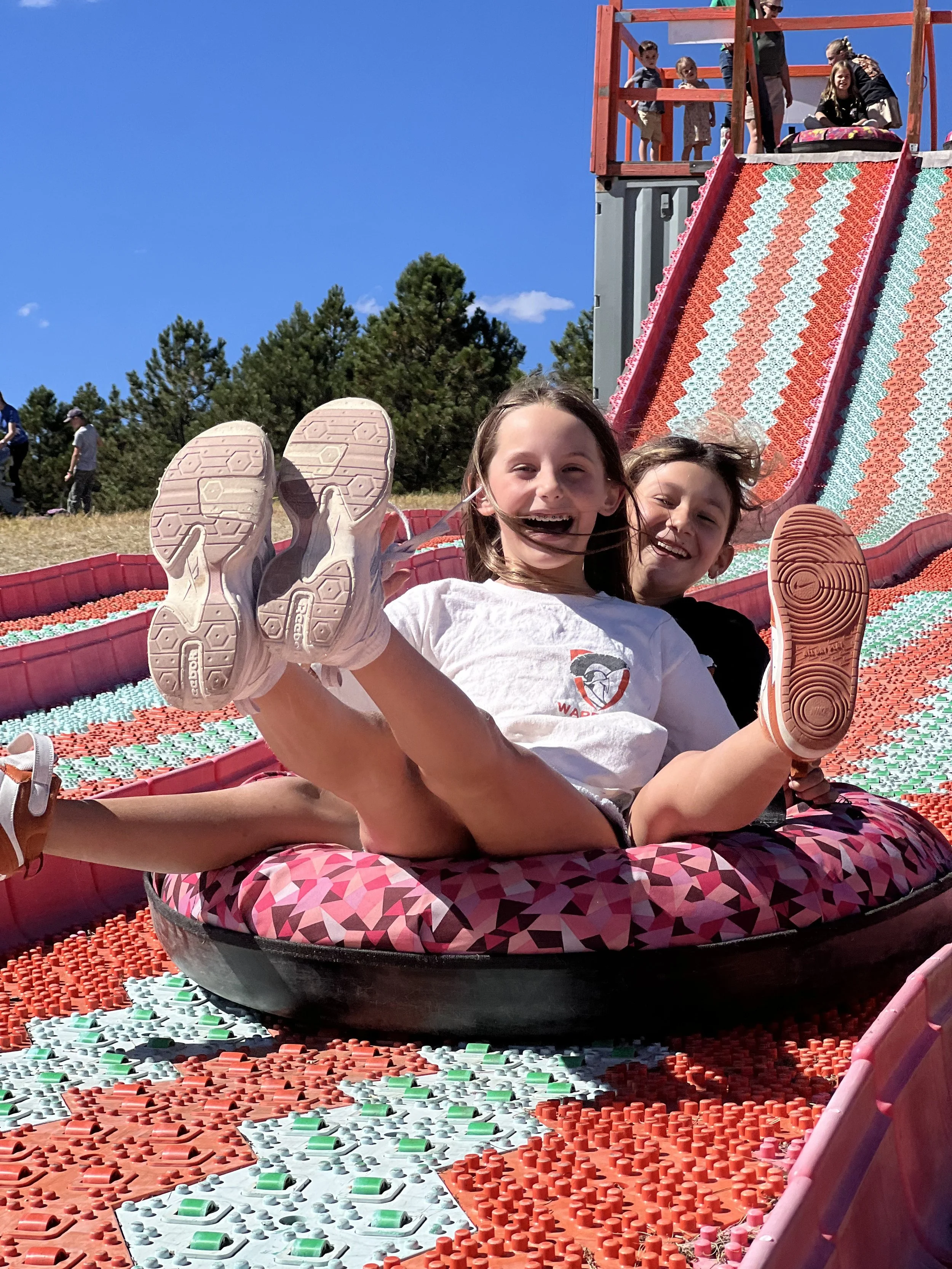 Students Tube sliding at a pumpkin patch