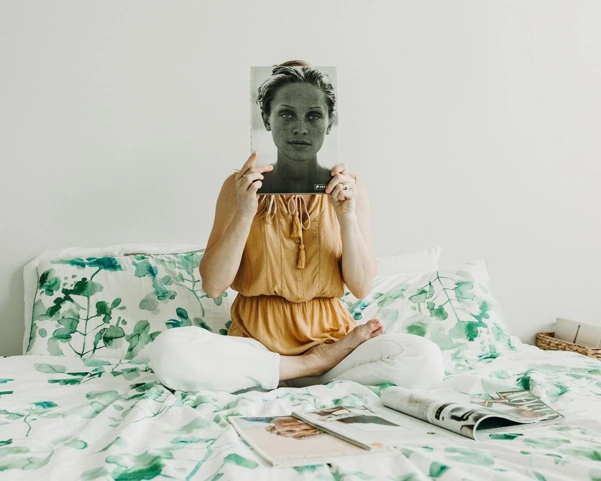 A woman holding a book by Personal Branding Photographer Joanna Zydel