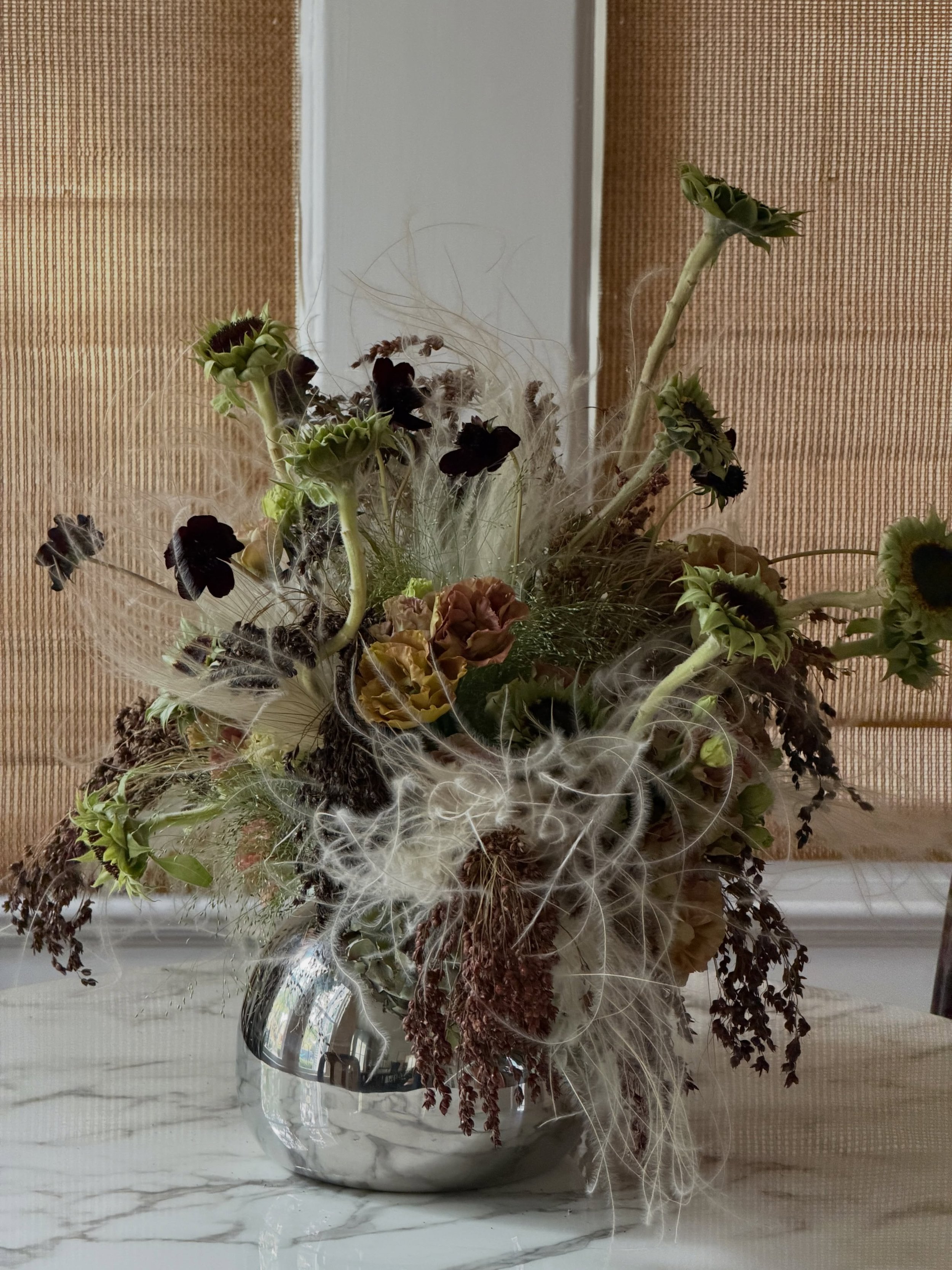 Playing with a fun asymmetrical vessel from @ikeausa - product from @mayeshhouston and @choice.flower 

I&rsquo;d love to see this on a bar or near some elevated minimalist merch in a shop 👀👀

San Antonio floral design
Fall flowers
Event flowers