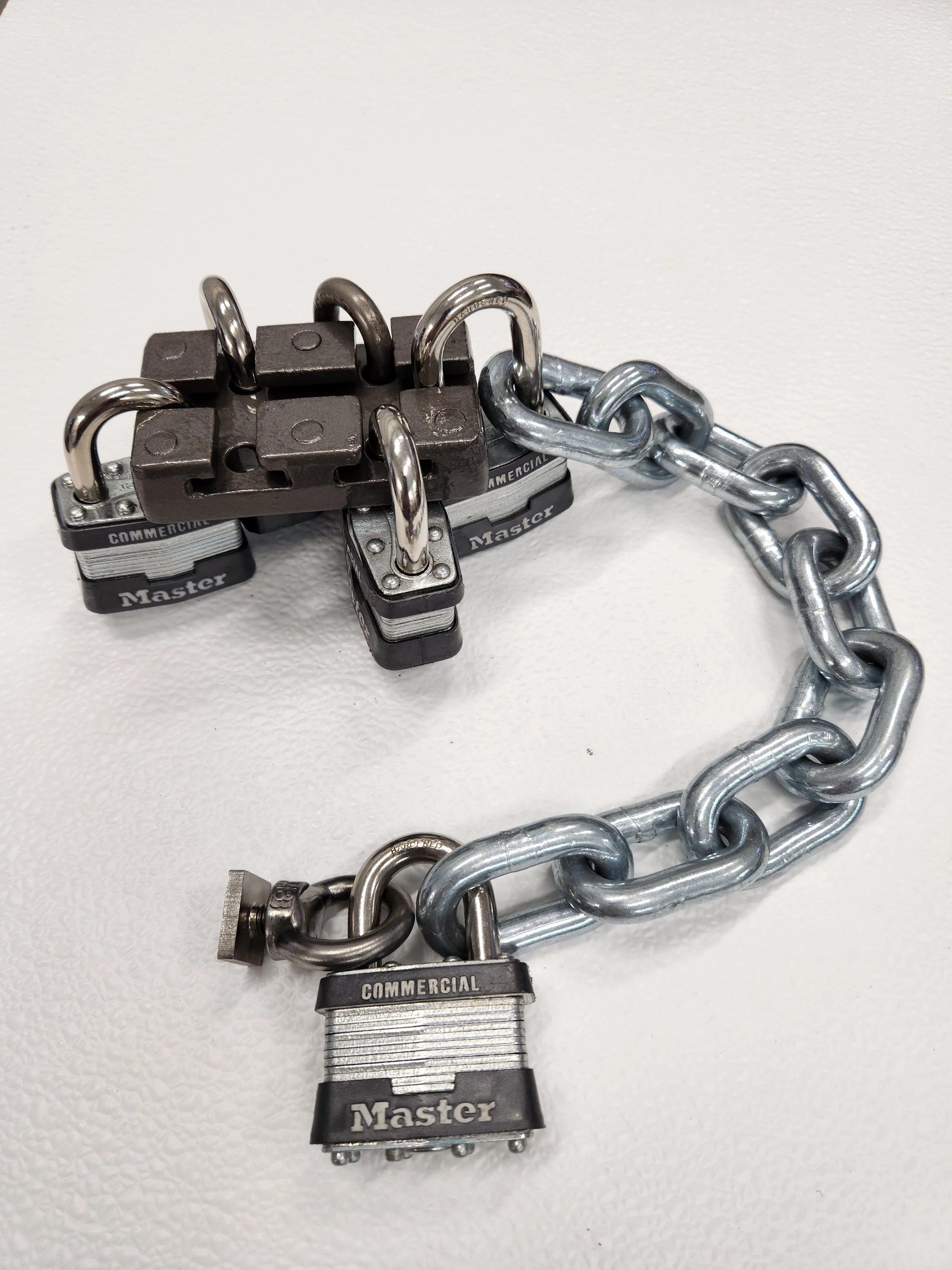 MULTI PADLOCK LOCKING SYSTEM CXL270 HAS A COMPACT SIZE JUST 2" x 3.3" RECTANGLE AND ACCEPTS 7 PADLOCK WITH 5/16" MAX SHACKLE