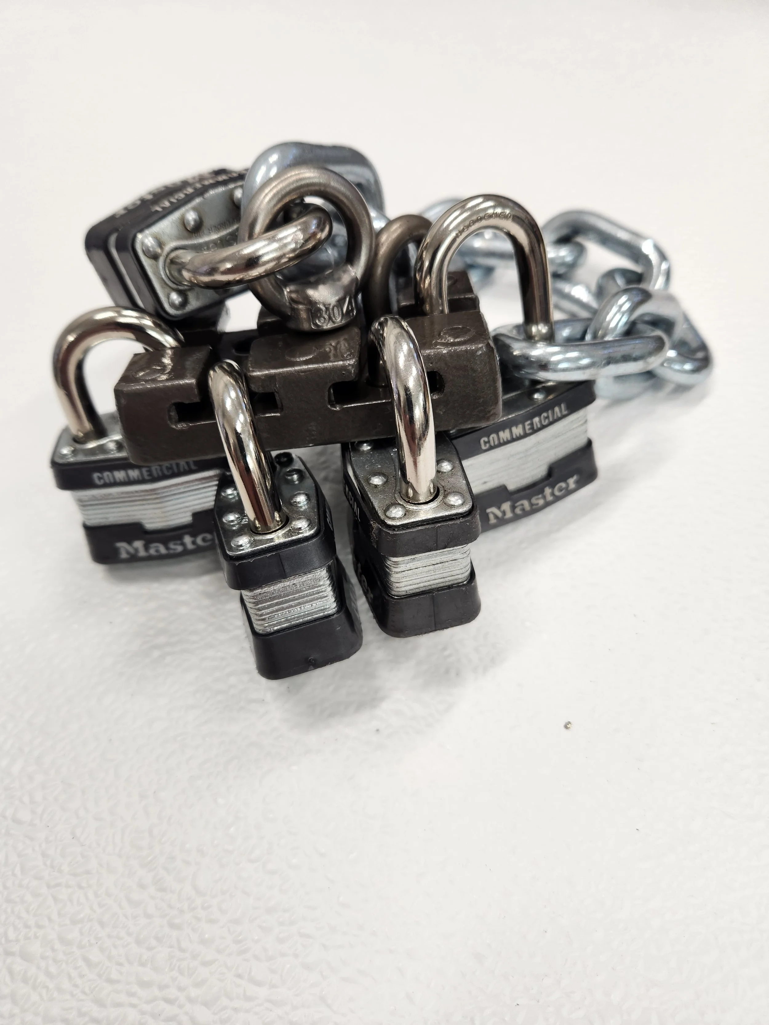MULTI PADLOCK LOCKING SYSTEM CXL270 HAS A COMPACT SIZE JUST 2" x 3.3" RECTANGLE AND ACCEPTS 7 PADLOCK WITH 5/16" MAX SHACKLE