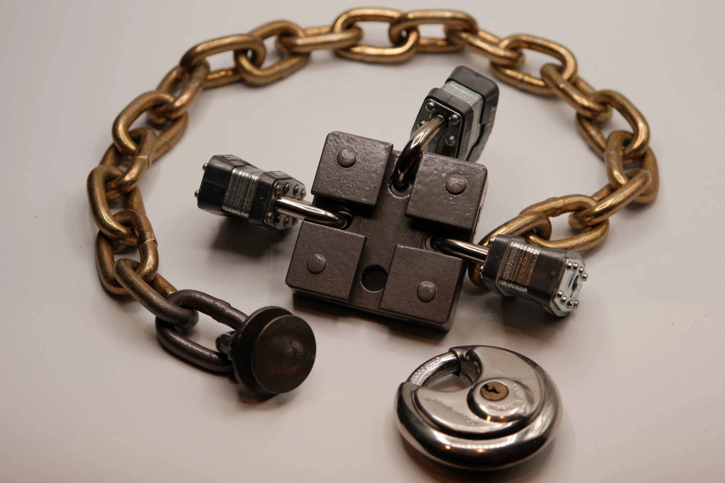 A multi padlock security system for gates