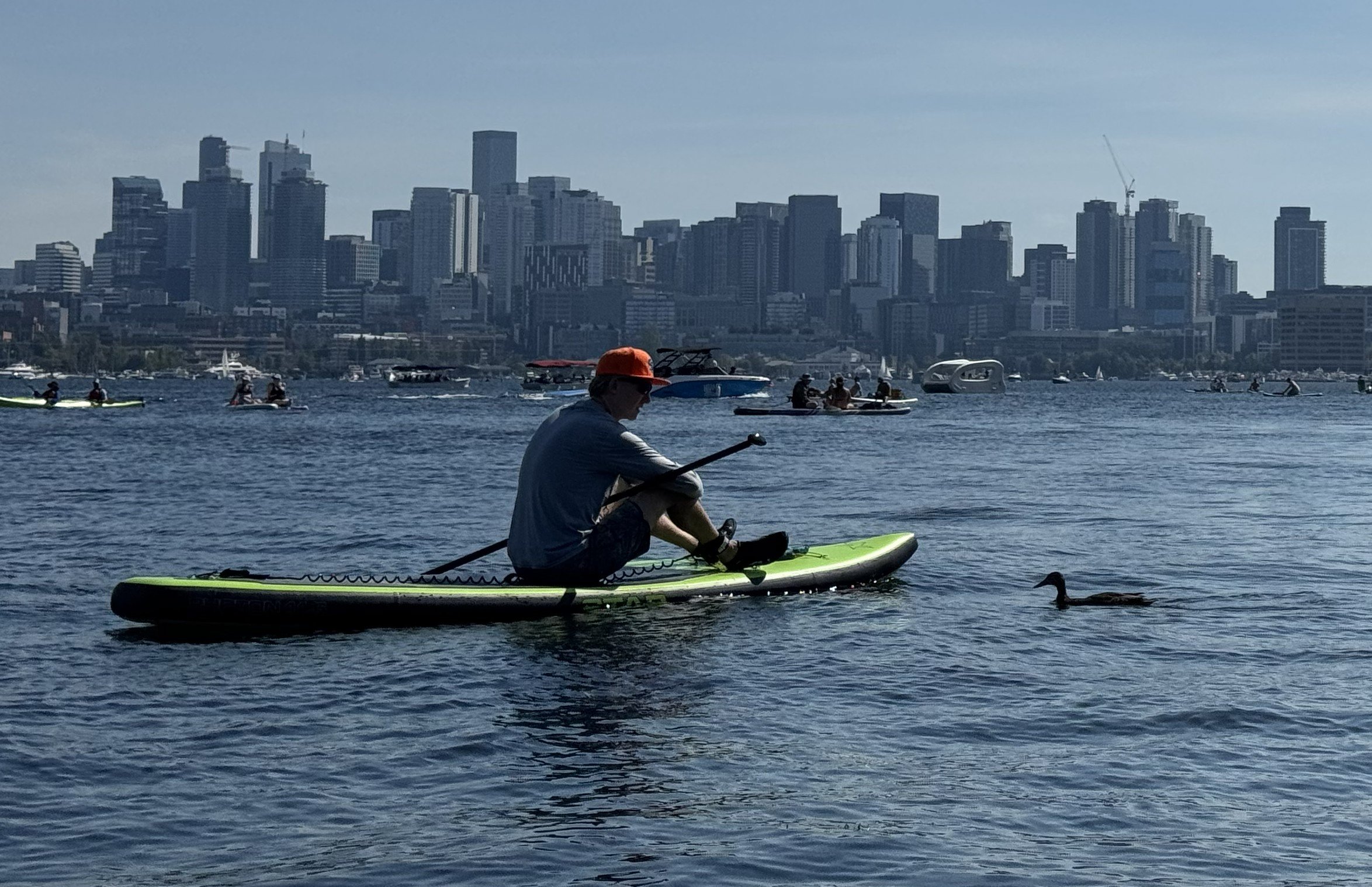 Aaron with a duck on the waters of Lake Union