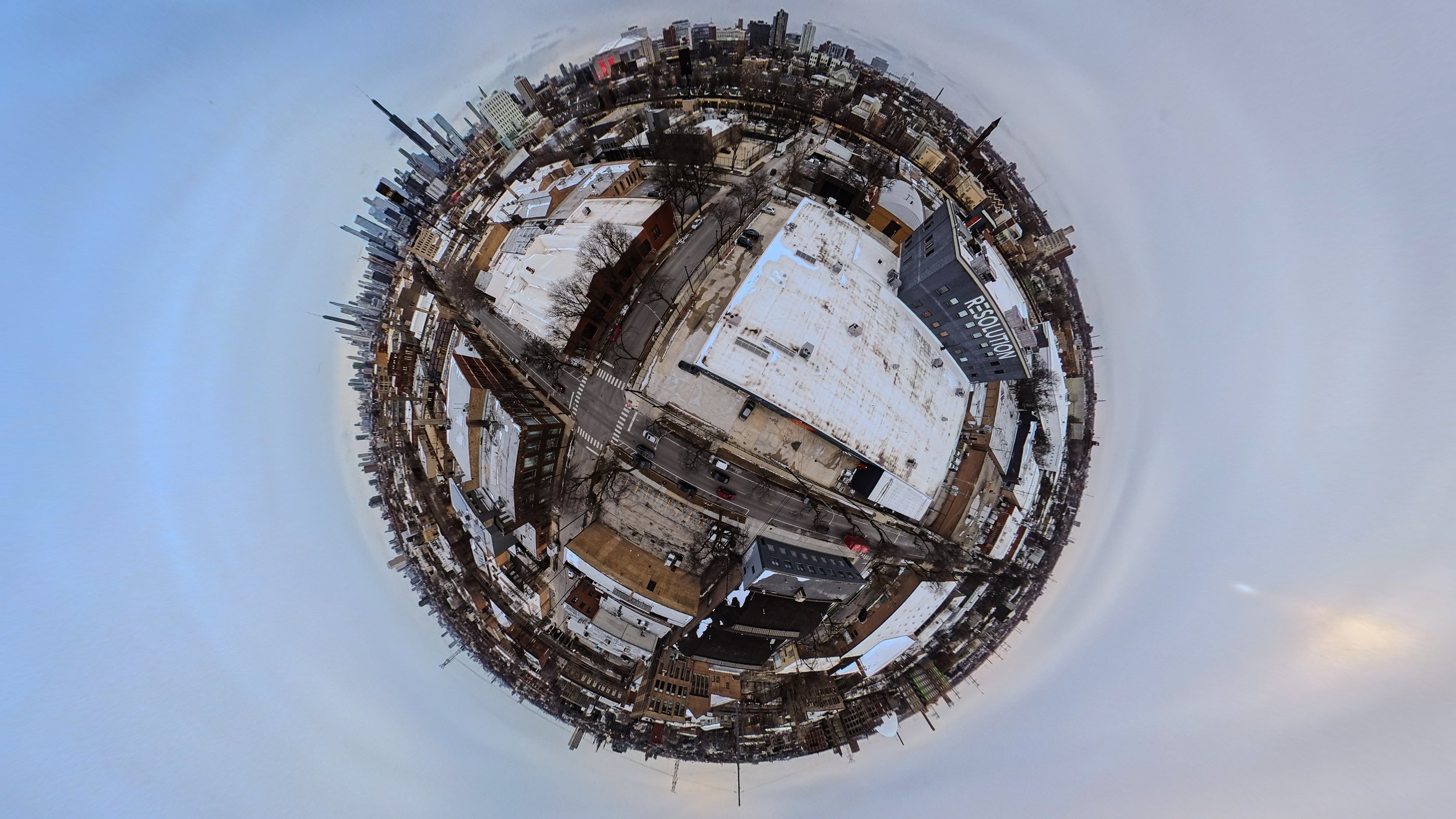 360 drone-style aerial capture above Resolution Studios in Chicago with tiny planet city view and production testing