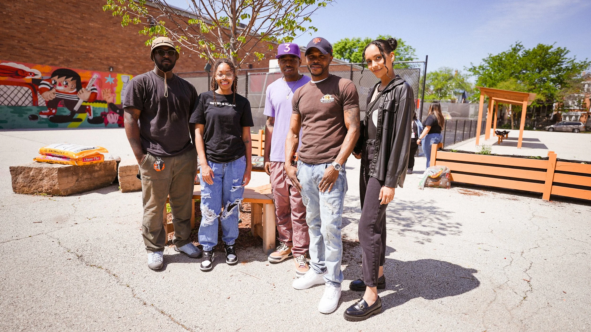 Little Village community outdoor play space build with creative team, organizers, and neighborhood project support