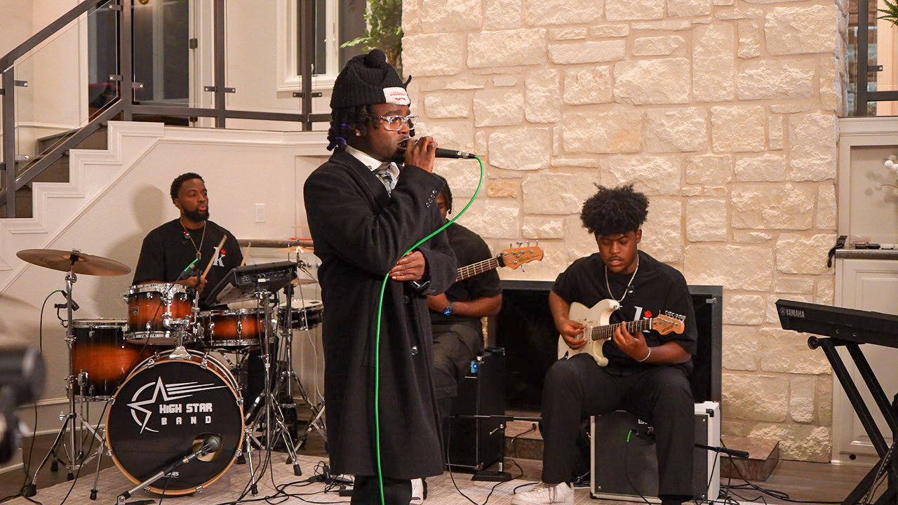 Young Deji performing live with musicians at The Kozy Experience in Austin during independent SXSW-week event coverage