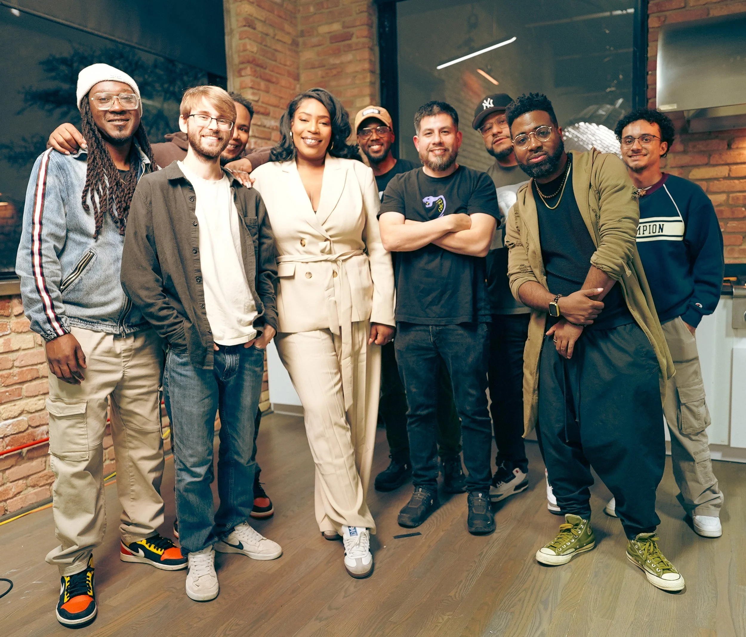 Creative team group photo during a SoundBites Chicago production setup at a professional studio space