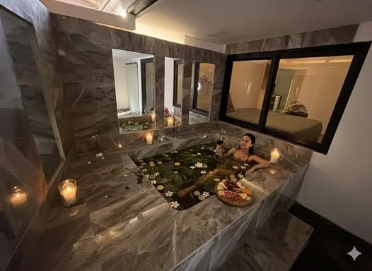 Relaxing massage with hot stones after herbal bath, ultimate serenity spa escape.
