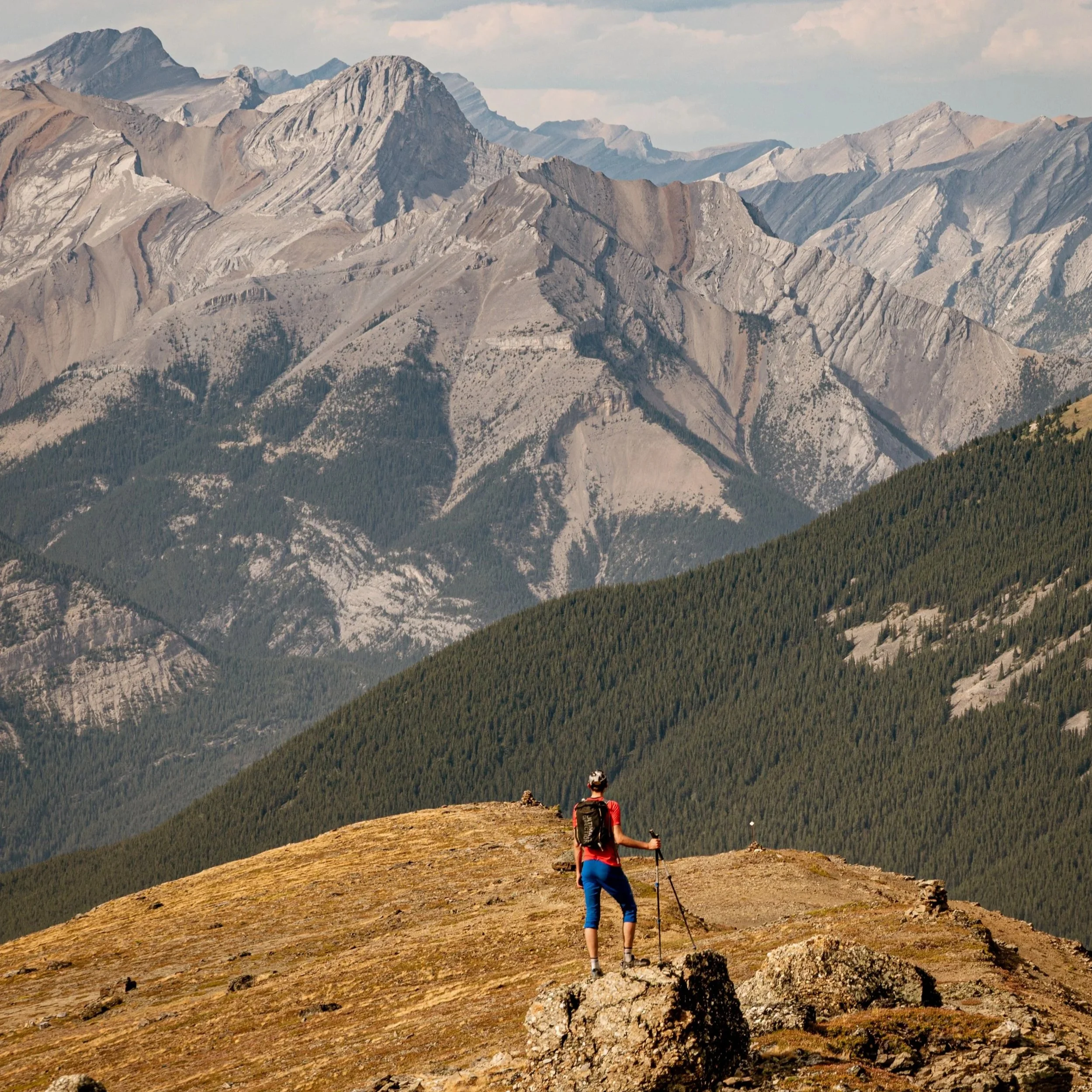 mountains-rockies-banff-canmore-kananaskis-larches-hiker.jpg